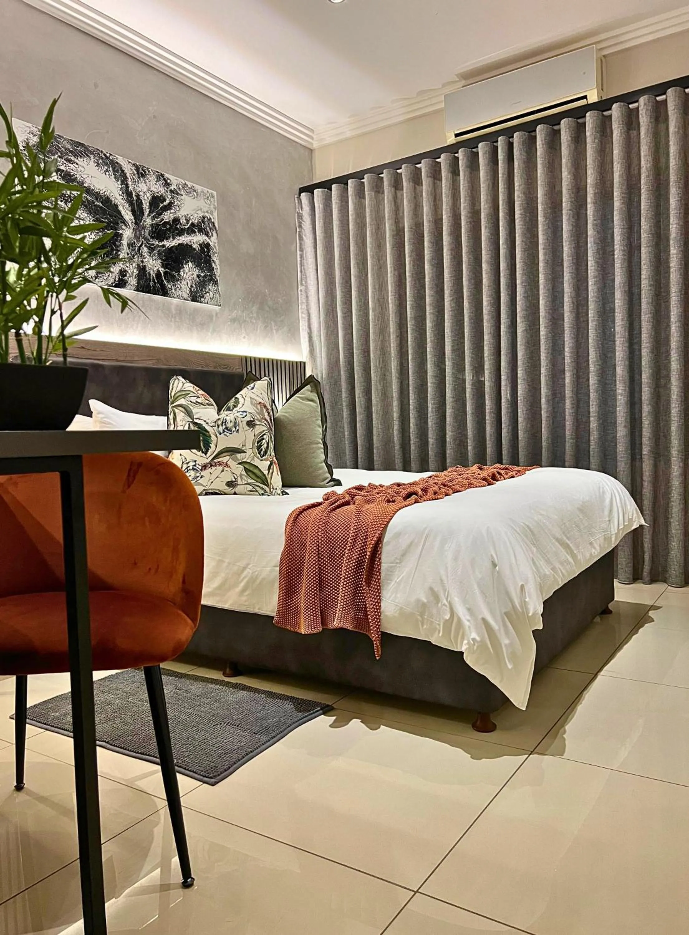 Bed in The Cycad Lodge & Chalets