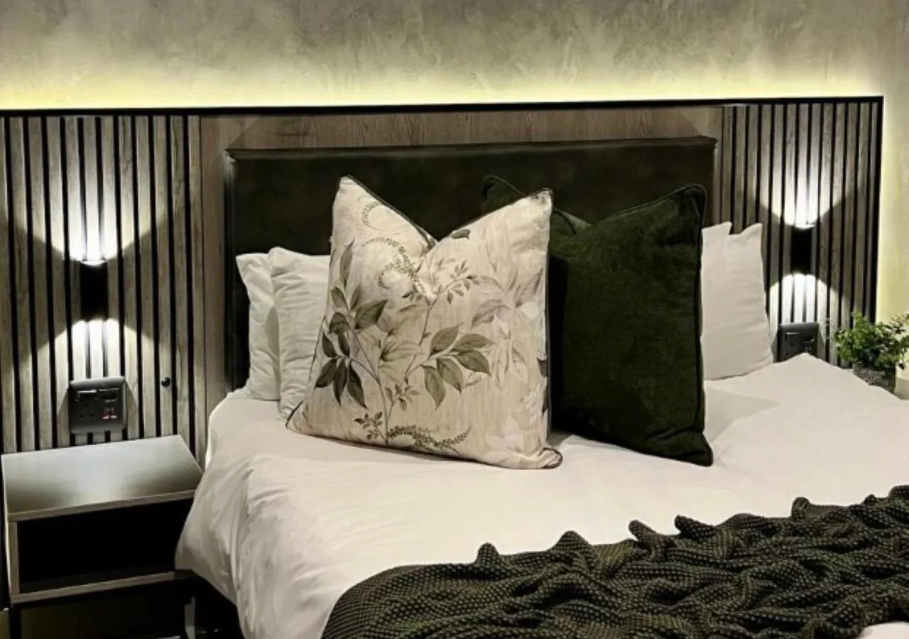 Bed in The Cycad Lodge & Chalets