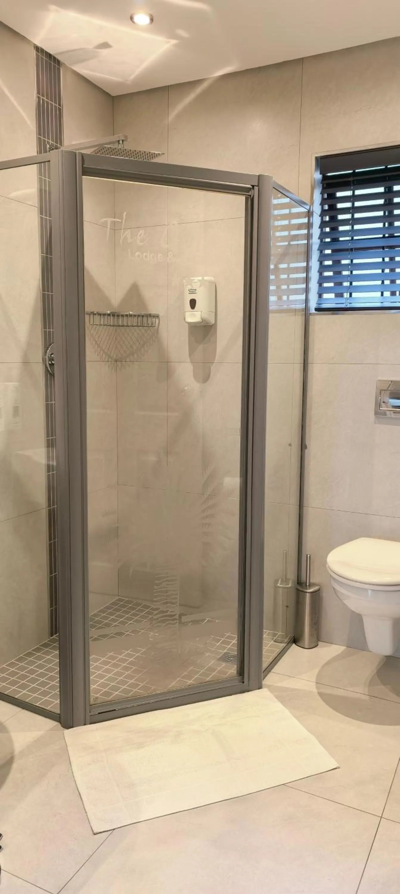 Bathroom in The Cycad Lodge & Chalets