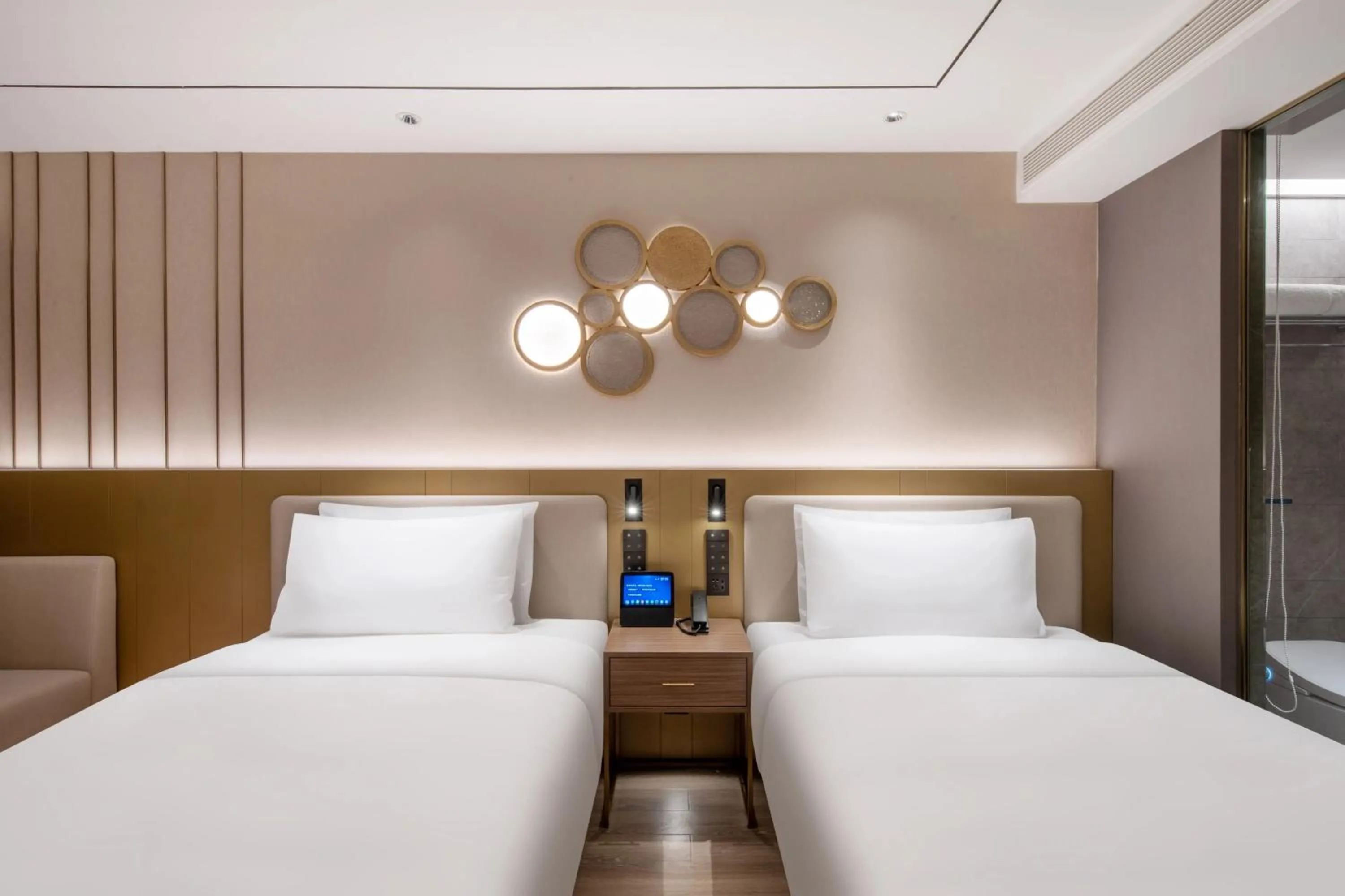 Bed in Orange Hotel Beijing West Railway Station