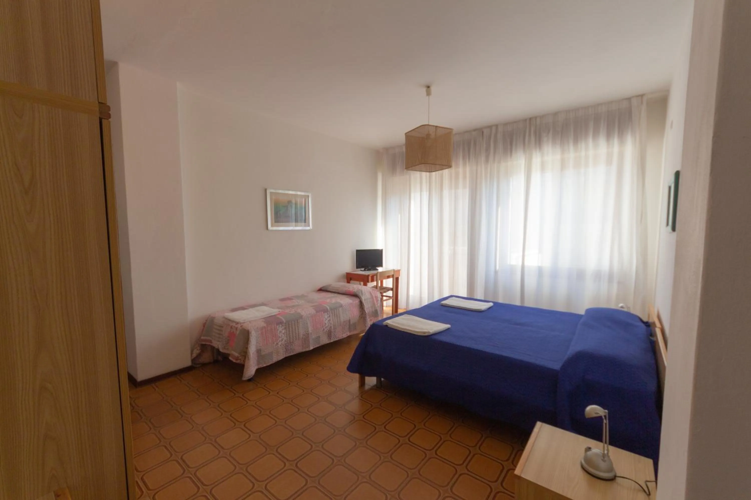 Bed in Hotel Calipso