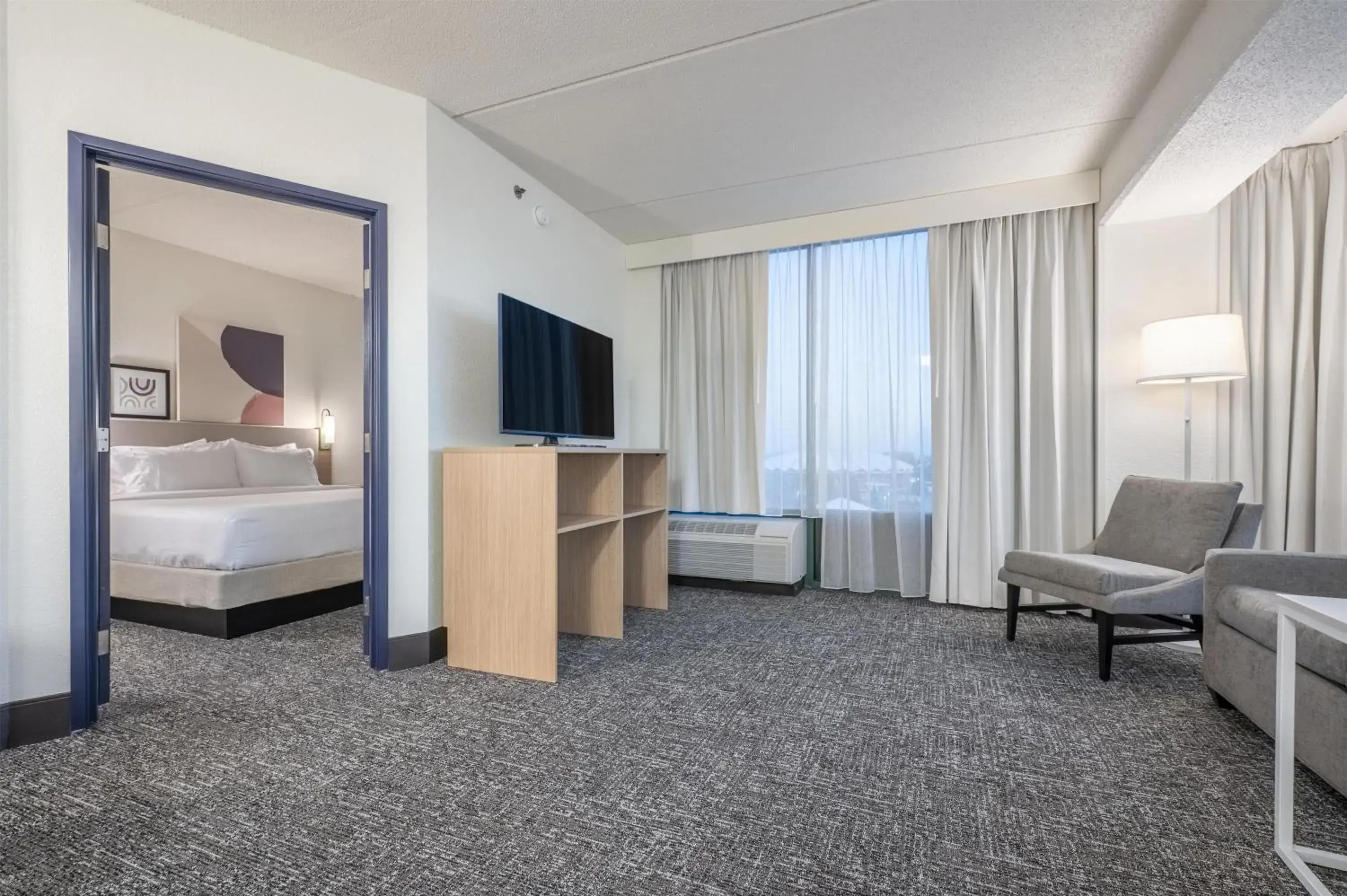 Living room, Bed in Spark By Hilton Madison Central Living room, Bed in Spark By Hilton Madison Central