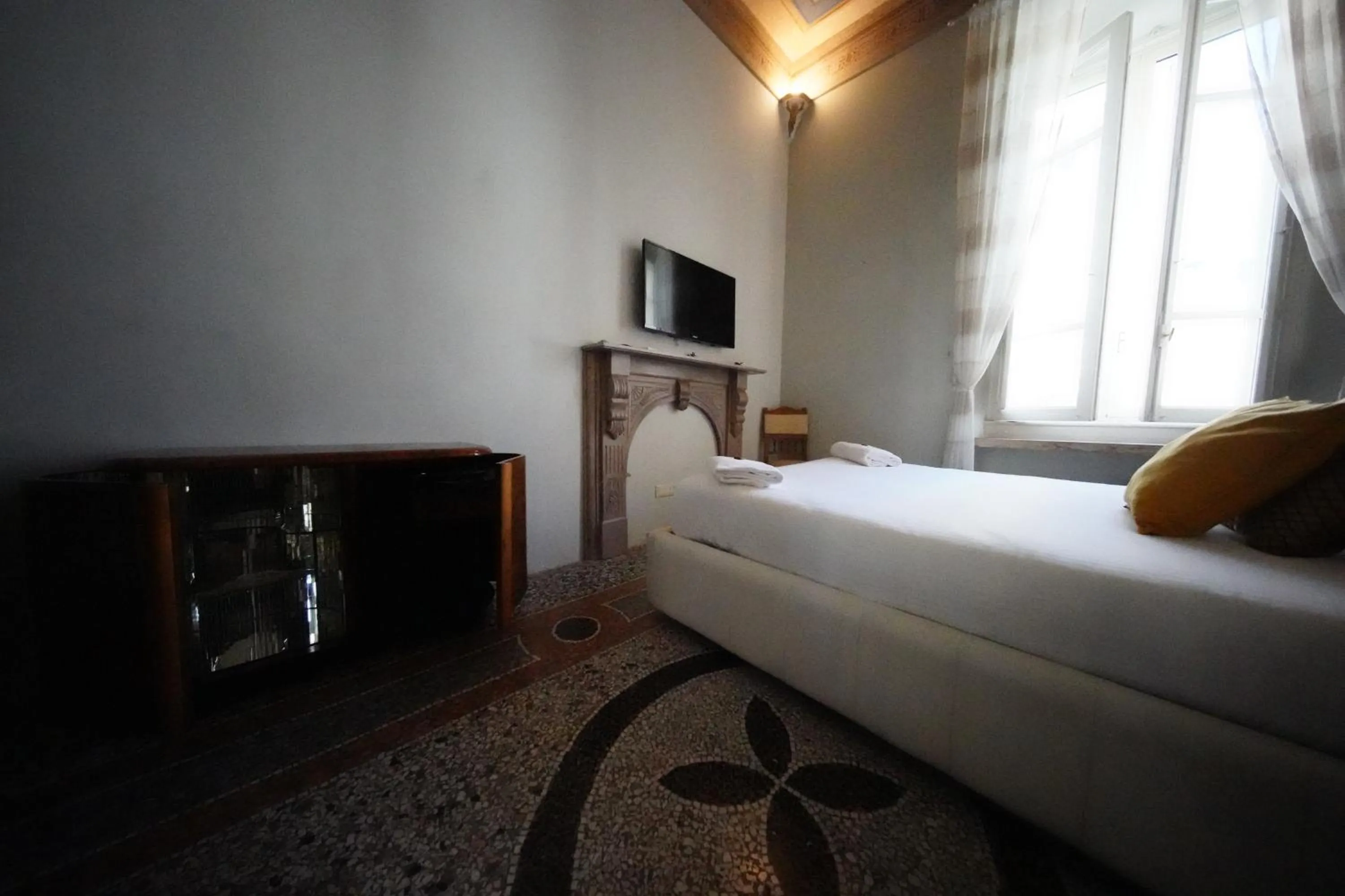 Bed in Nerva Accommodation Cavour