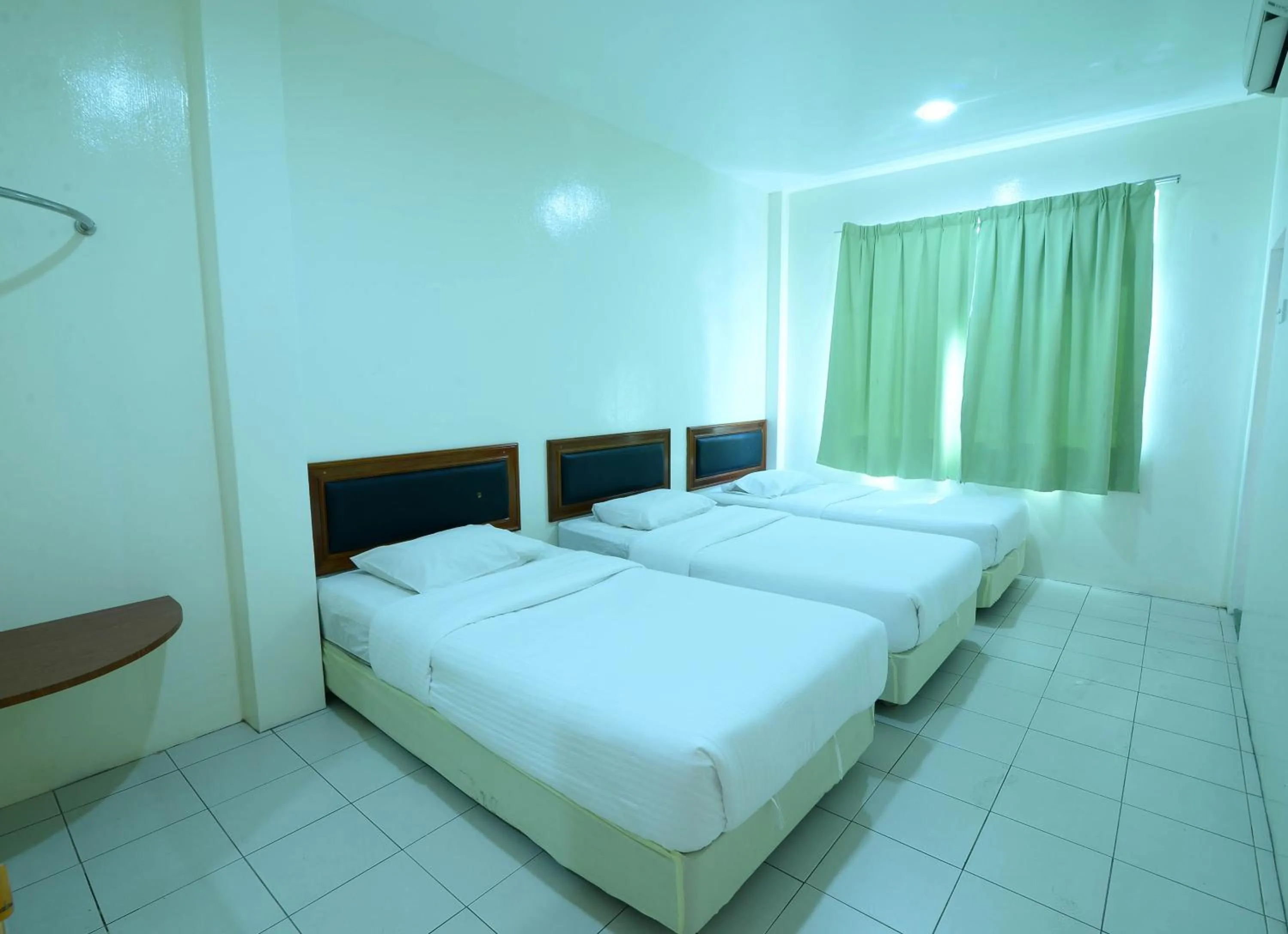 Bed in Mersing Hotel