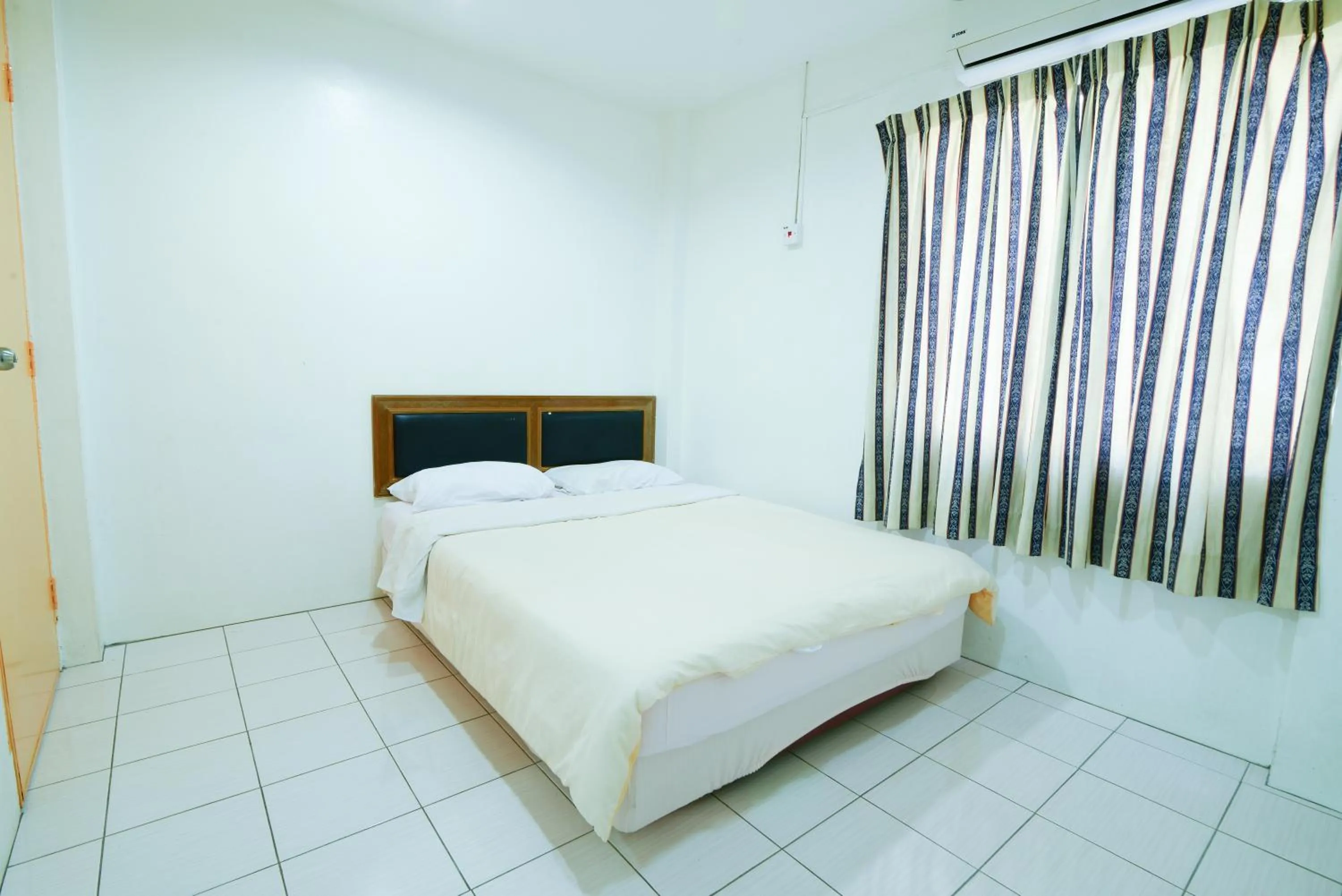 Decorative detail, Bed in Mersing Hotel