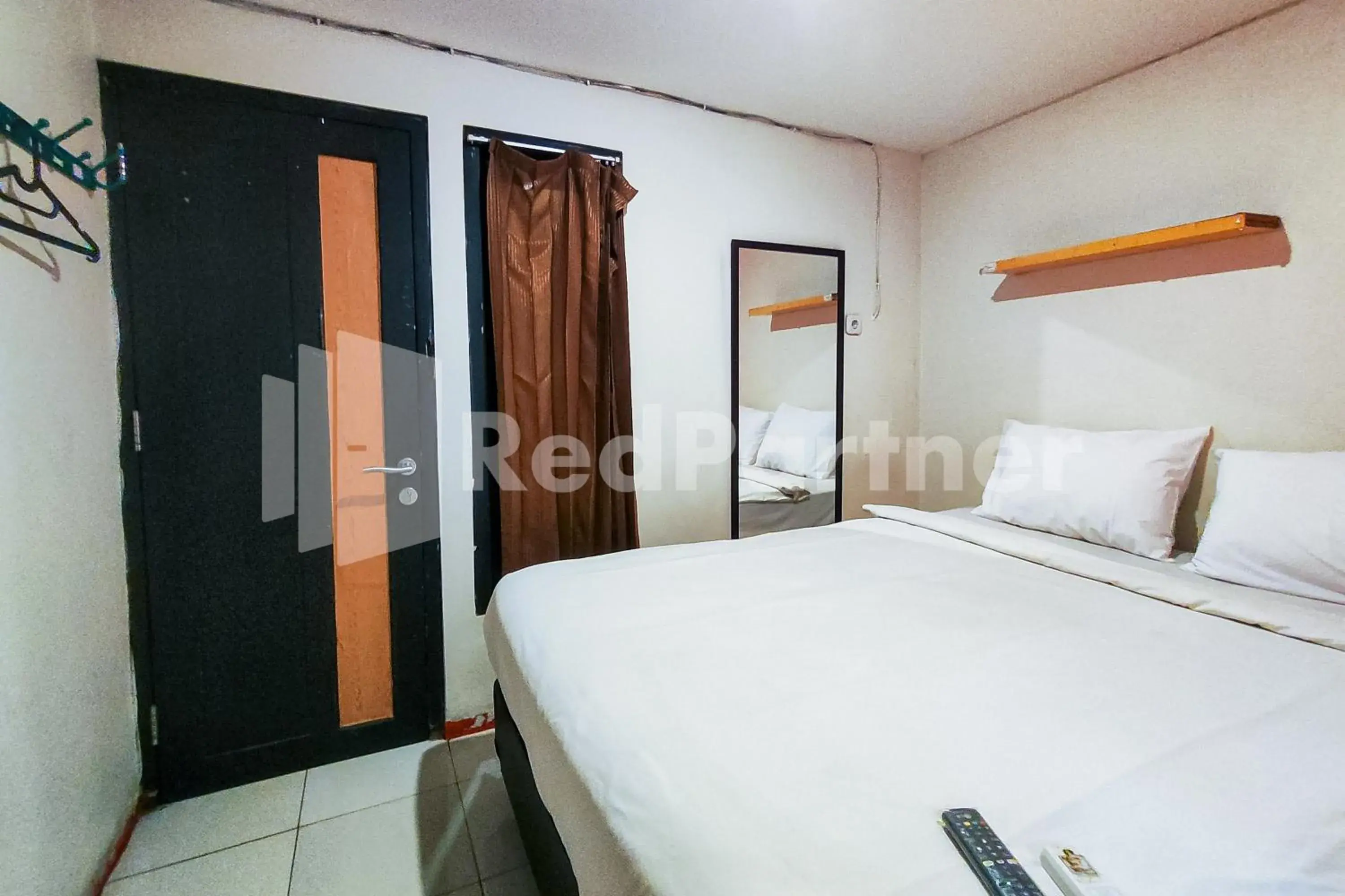 Bedroom, Bed in Audah Guesthouse Syariah RedPartner Bedroom, Bed in Audah Guesthouse Syariah RedPartner