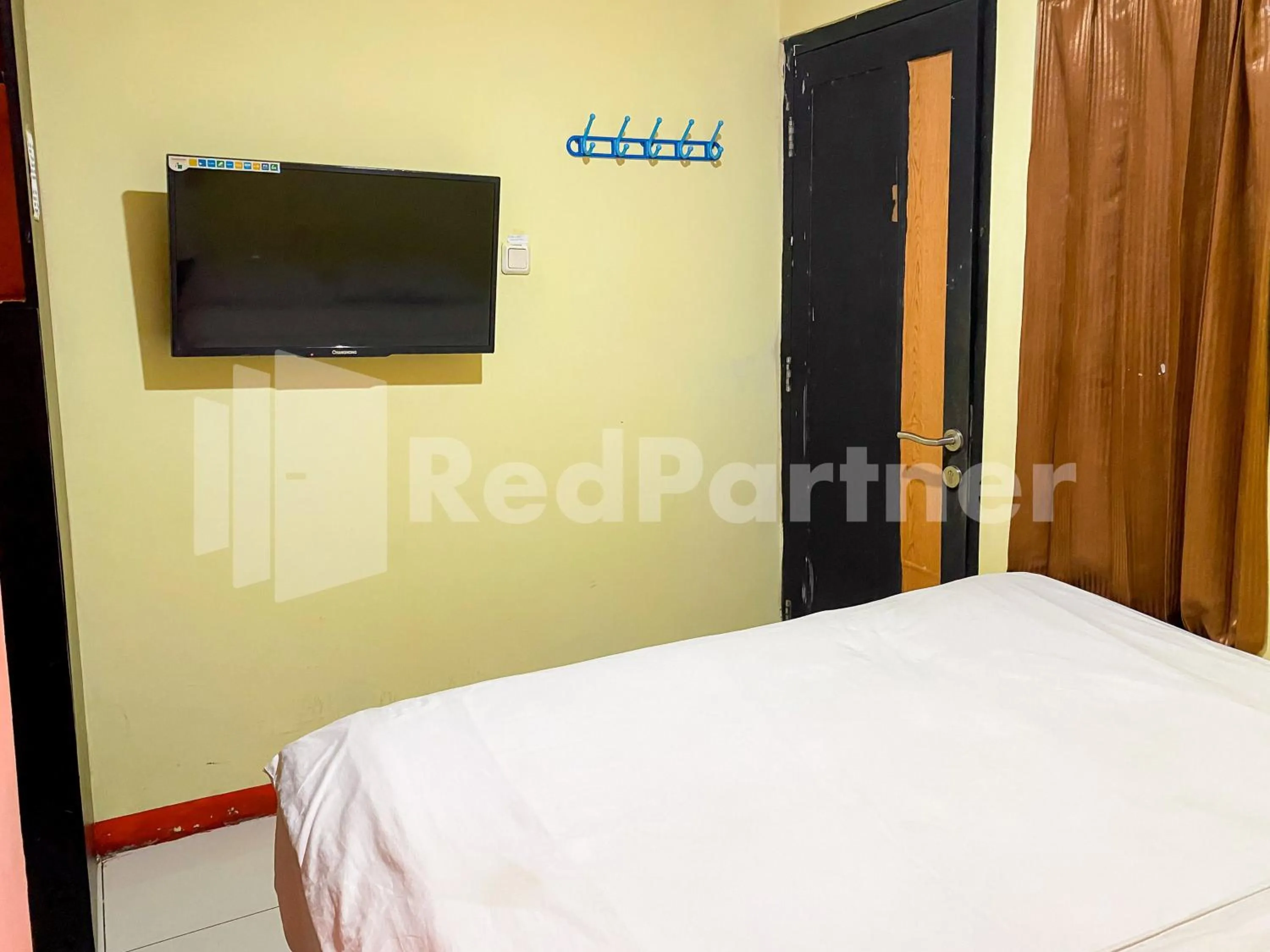 Bedroom, Bed in Audah Guesthouse Syariah RedPartner