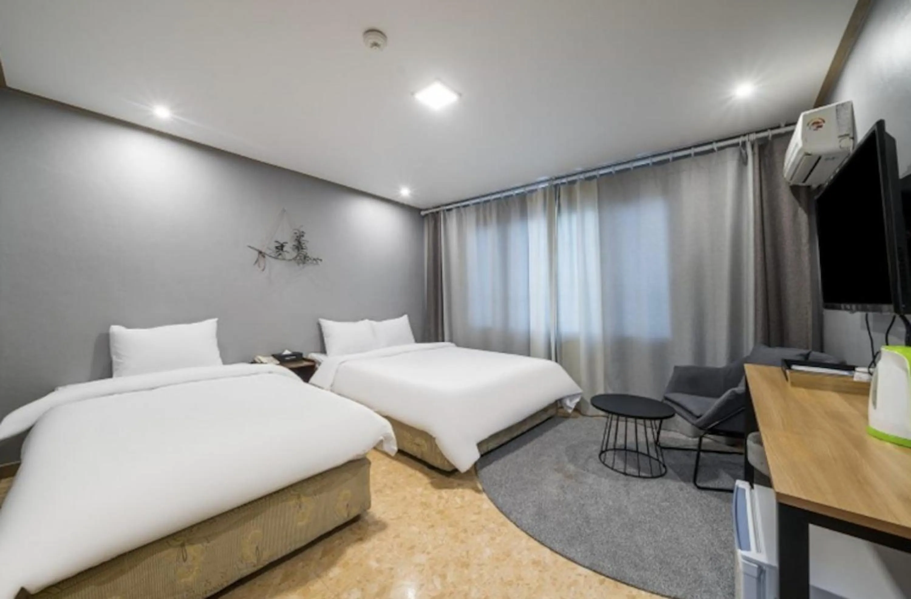 Bed in Jeju Pure Stay Ocean