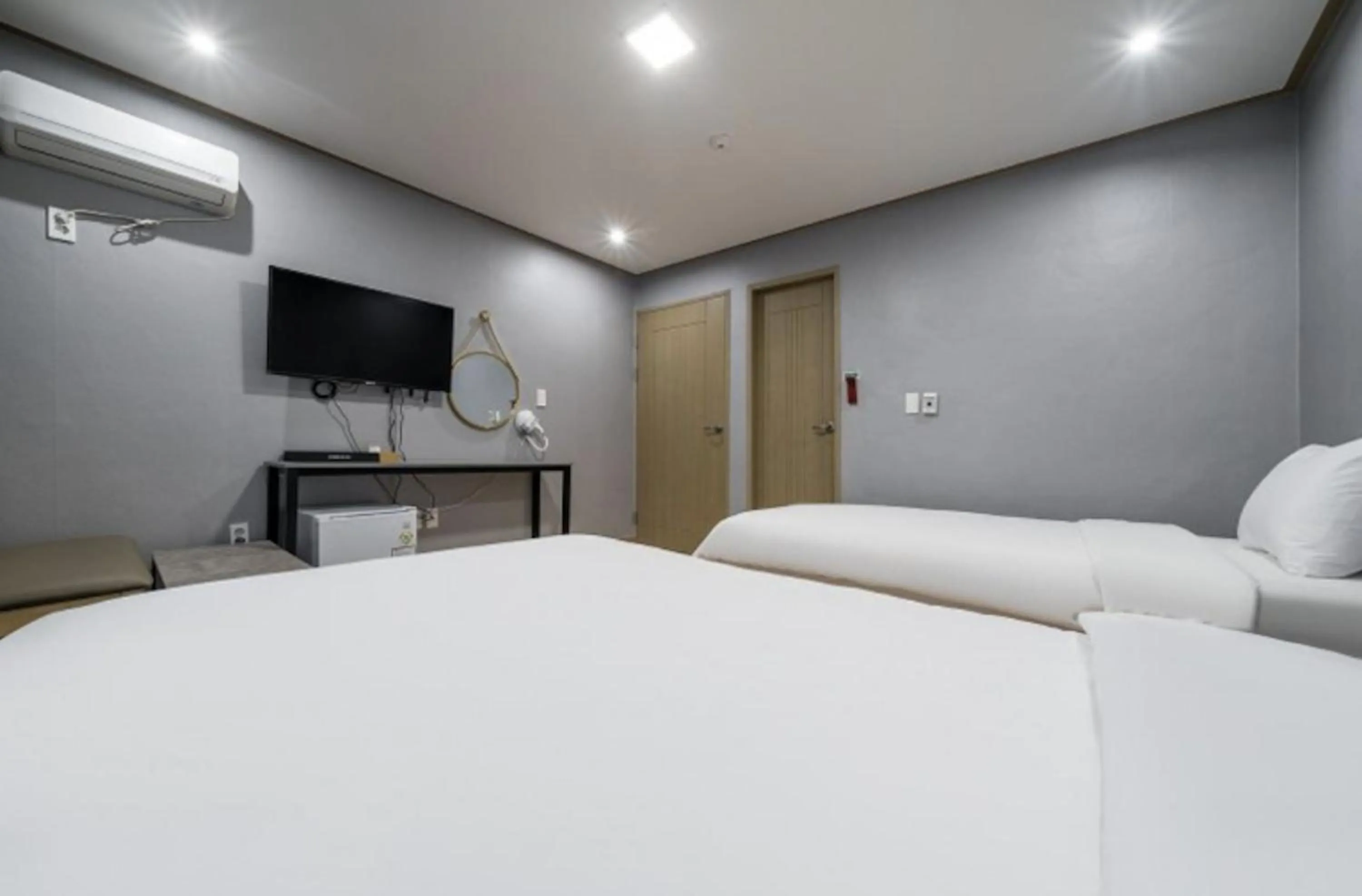 Bed in Jeju Pure Stay Ocean