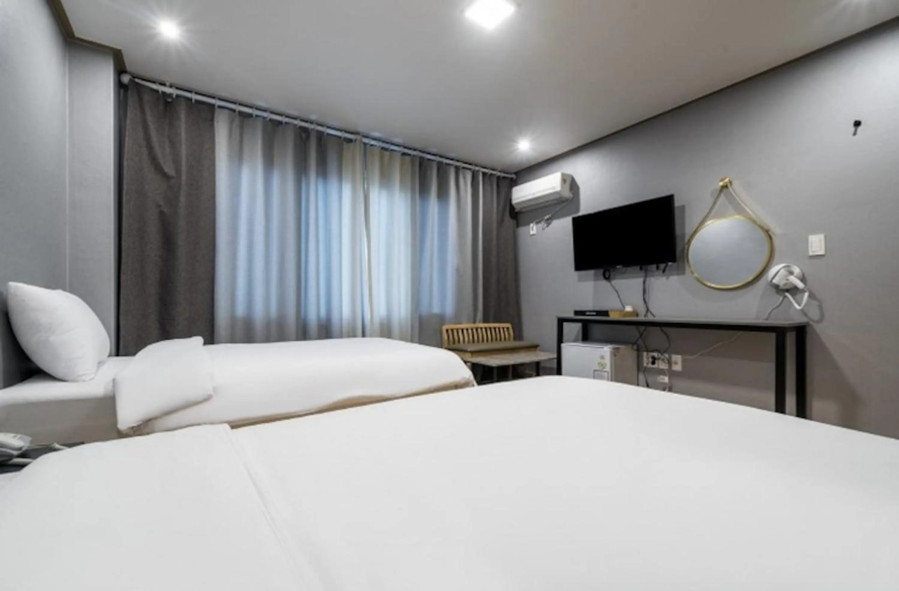 Bed in Jeju Pure Stay Ocean