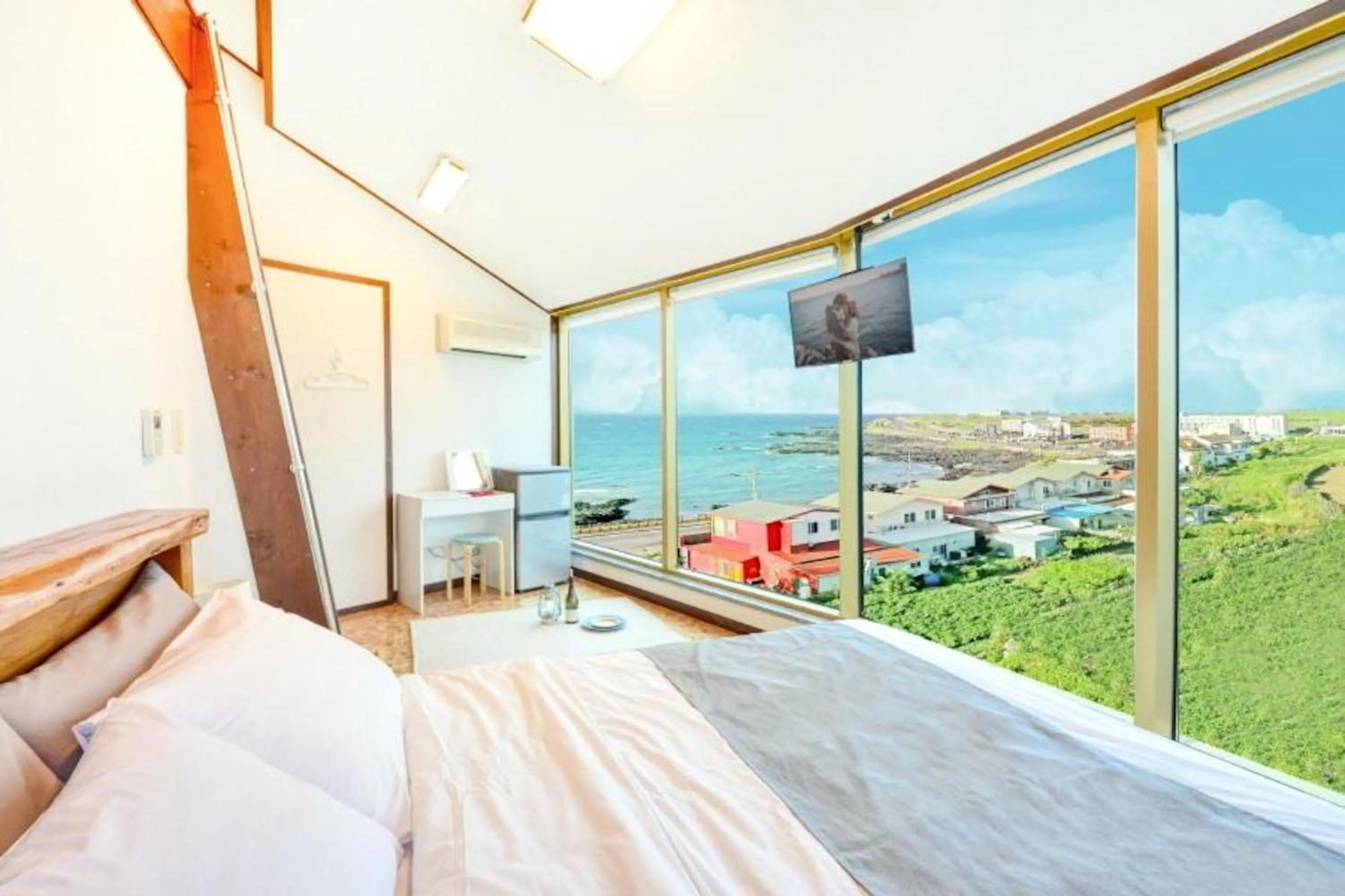 Bed in Jeju Pure Stay Ocean