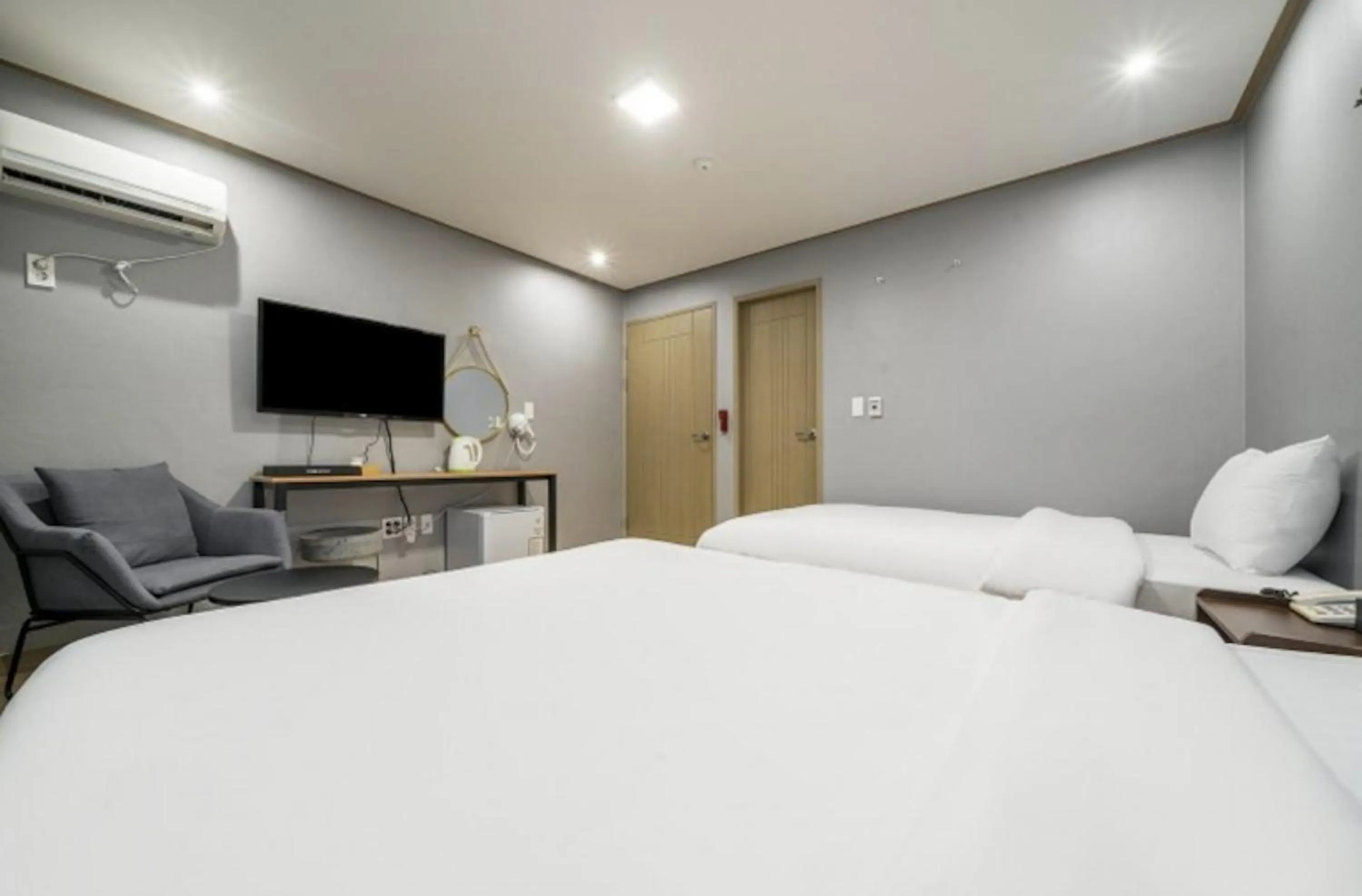 Bed in Jeju Pure Stay Ocean