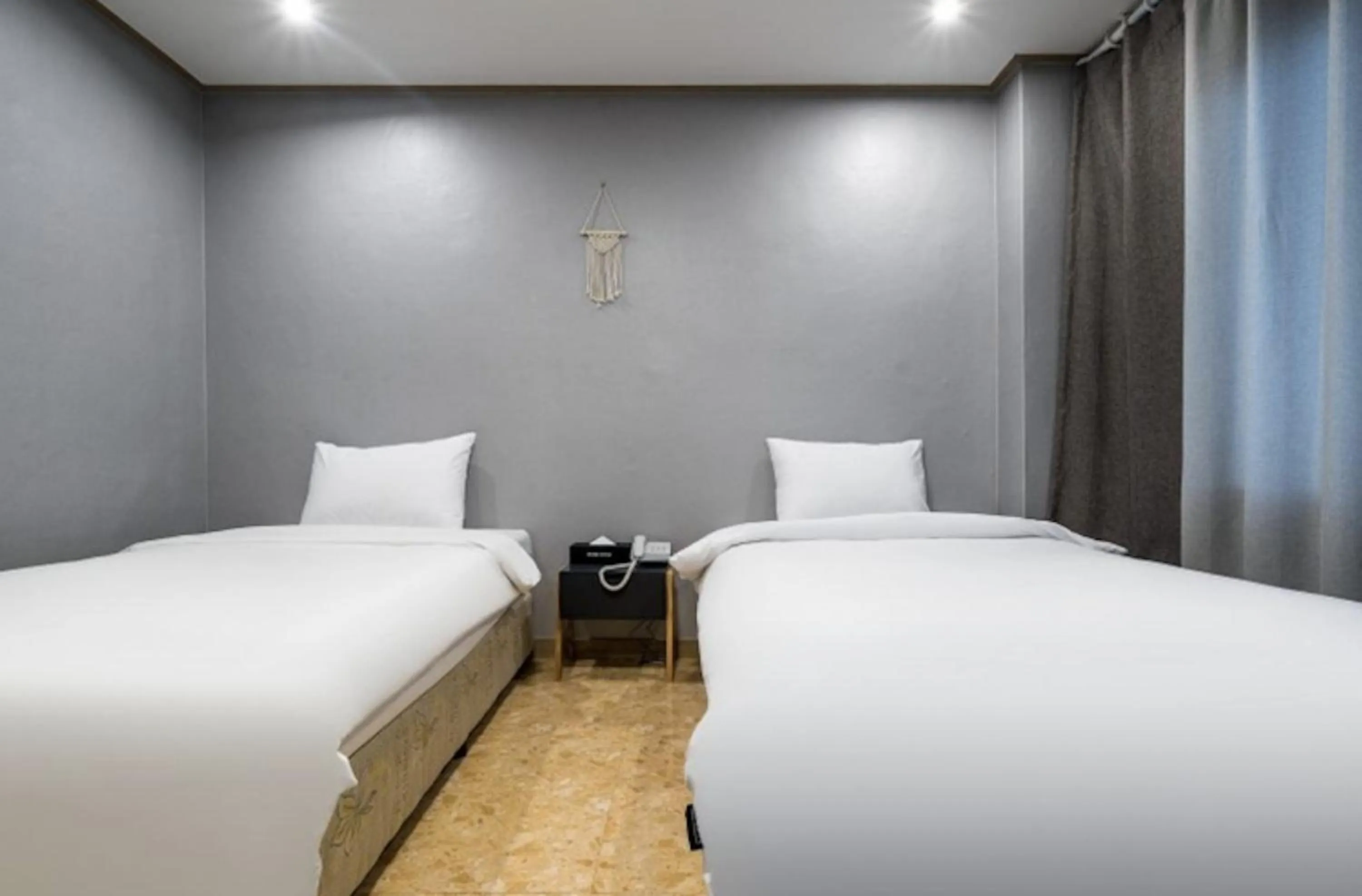 Bed in Jeju Pure Stay Ocean