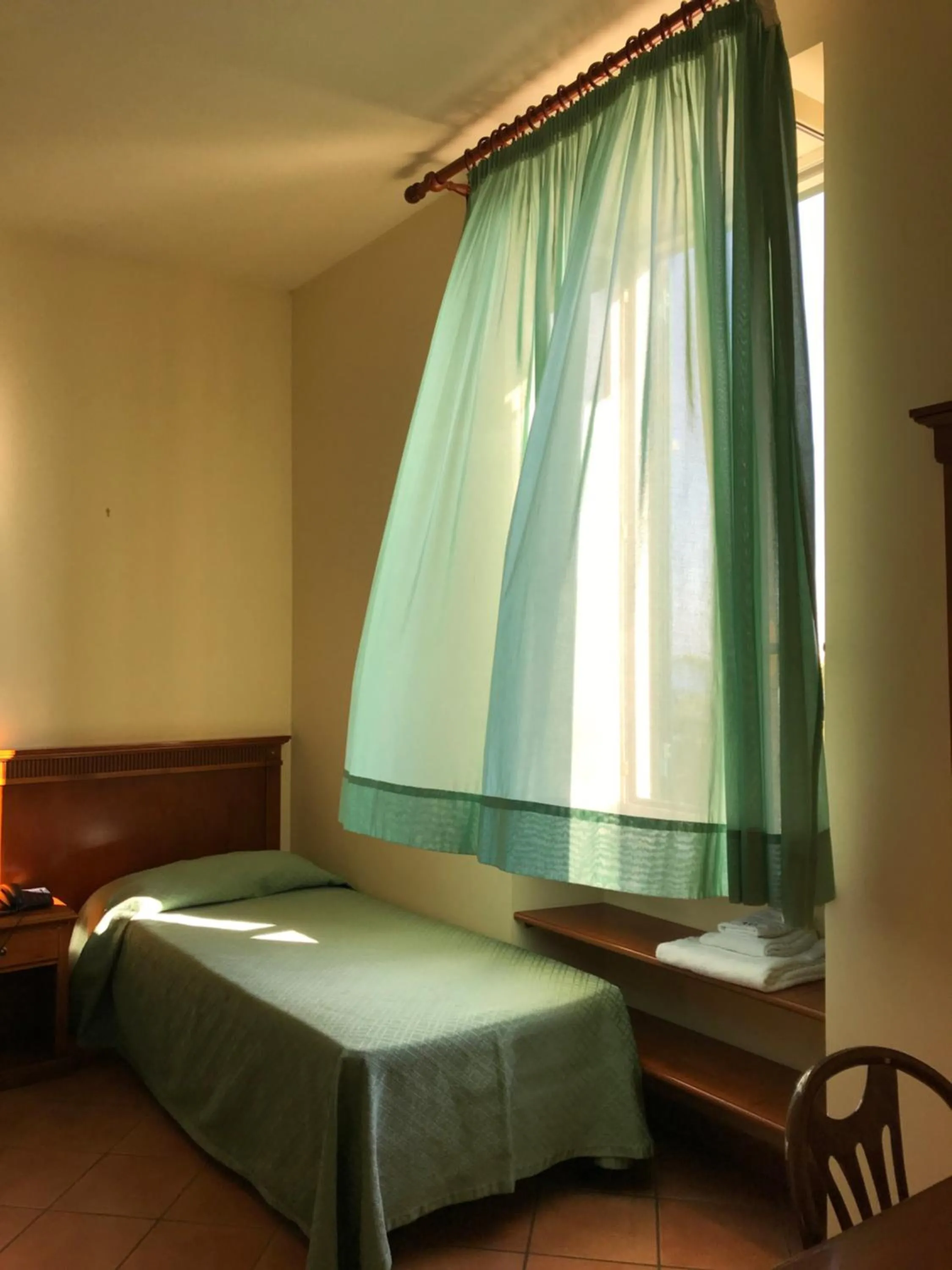 Bed in Villino Gregoraci Relais