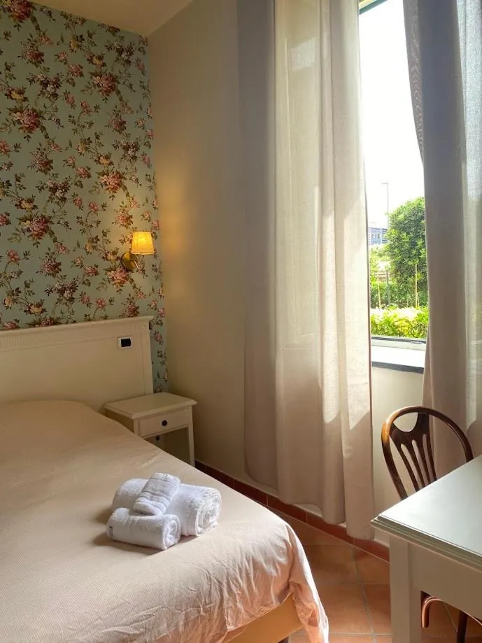 Bed in Villino Gregoraci Relais