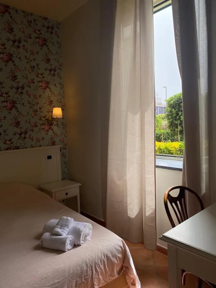 Bed in Villino Gregoraci Relais