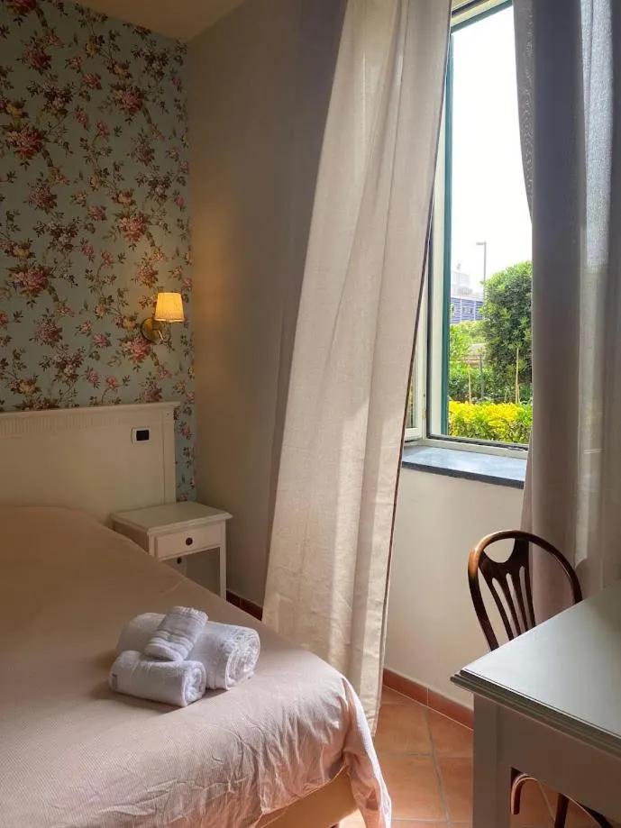 Bed in Villino Gregoraci Relais