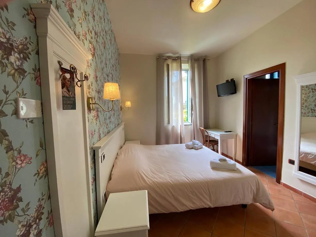 Bed in Villino Gregoraci Relais