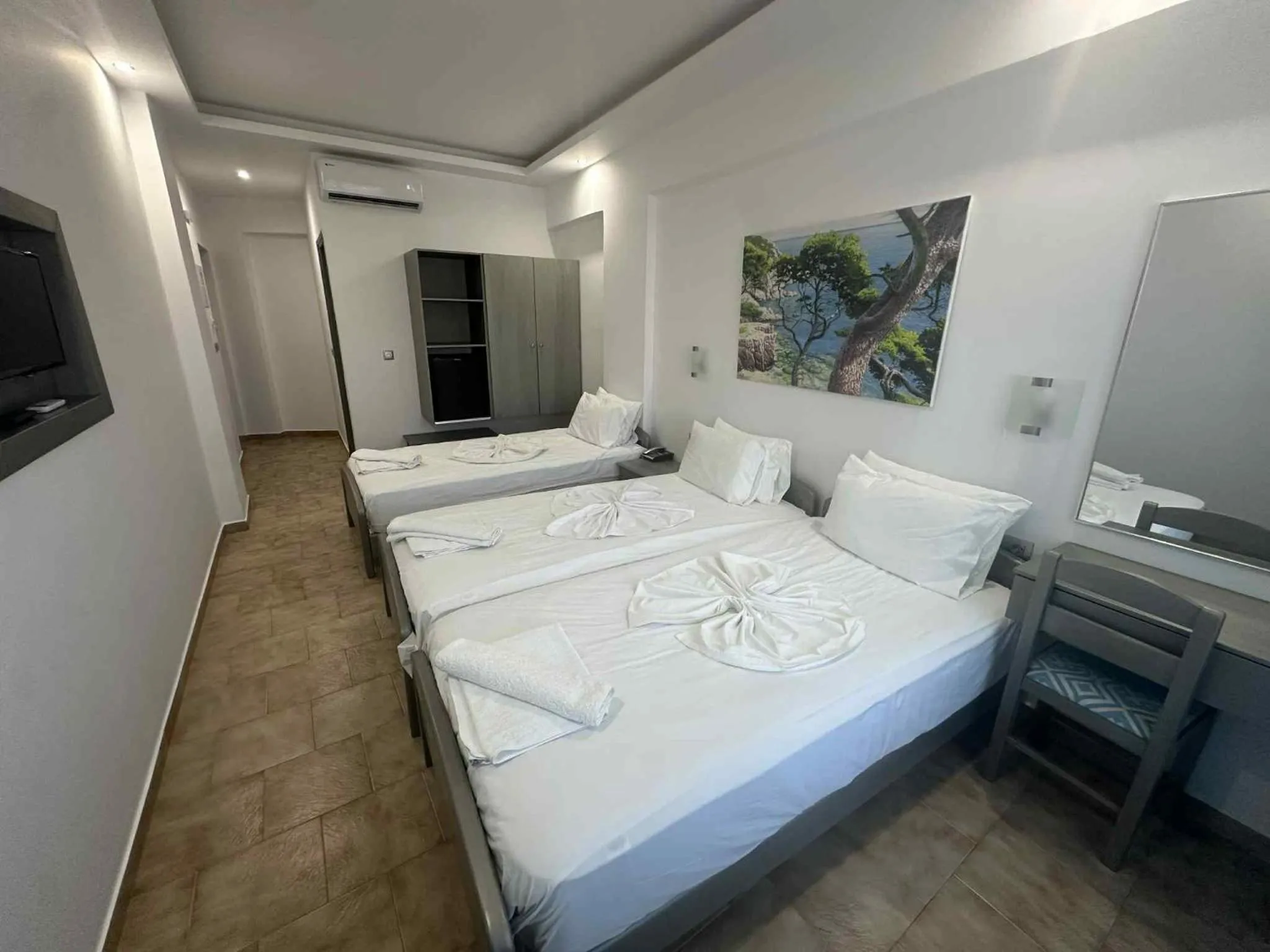 Bed in Oceanis Hotel