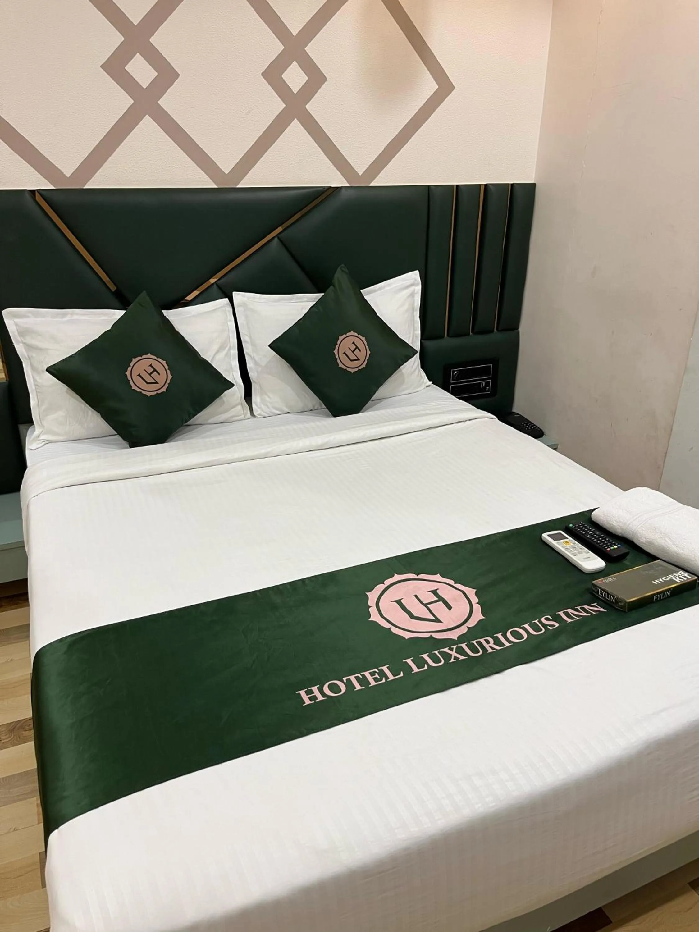 Bed in Hotel Luxurious Inn