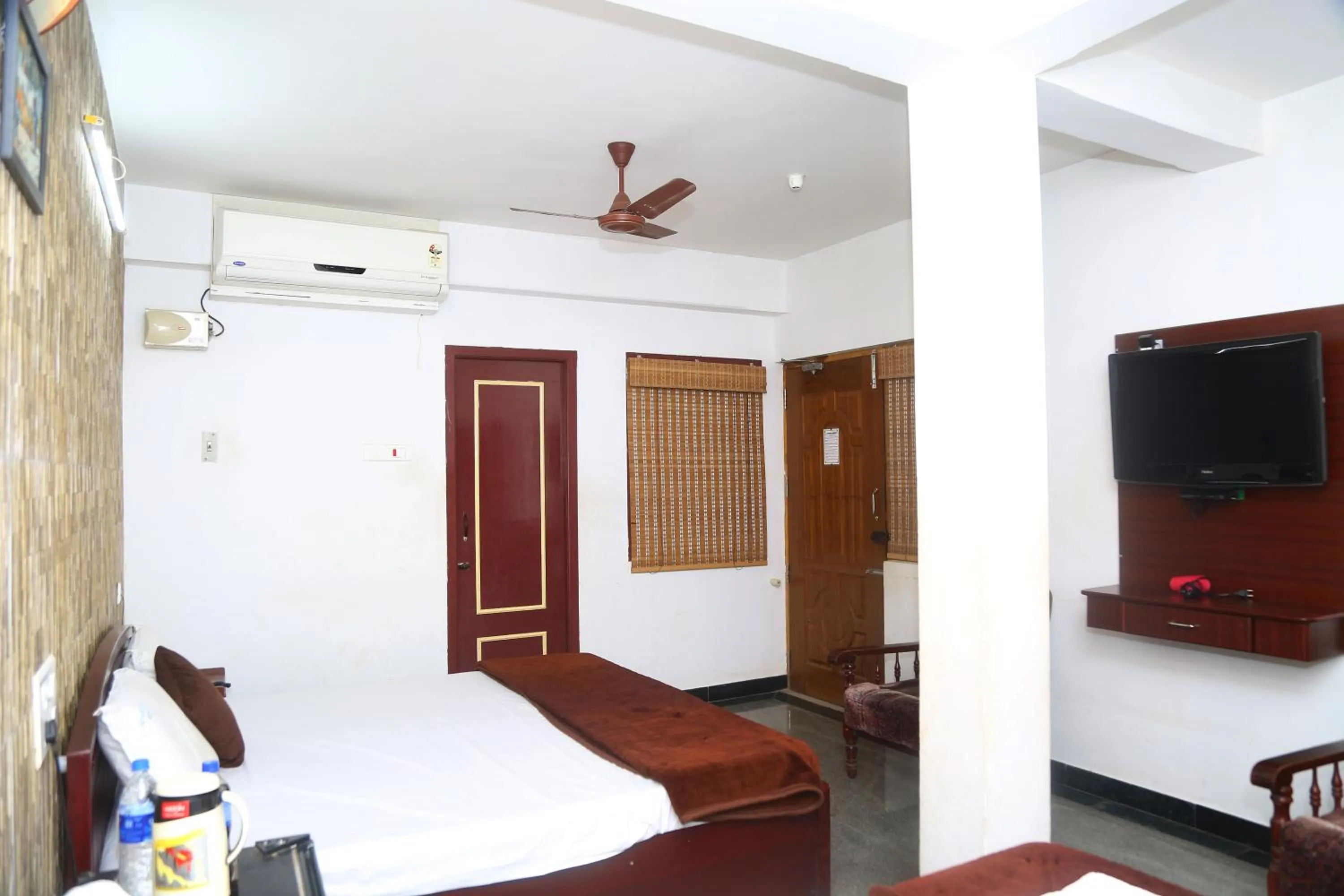 Photo of the whole room, Bed in Arudhra Residency