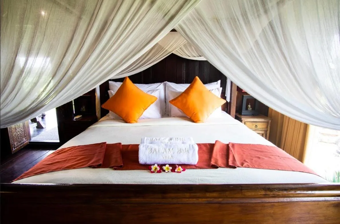 Bed in Balam Bali Villa