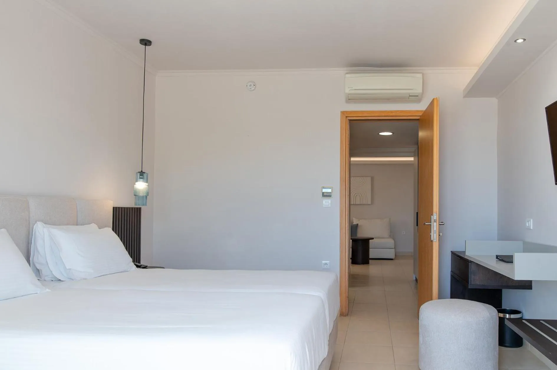 Bed in Grand Blue Beach Hotel