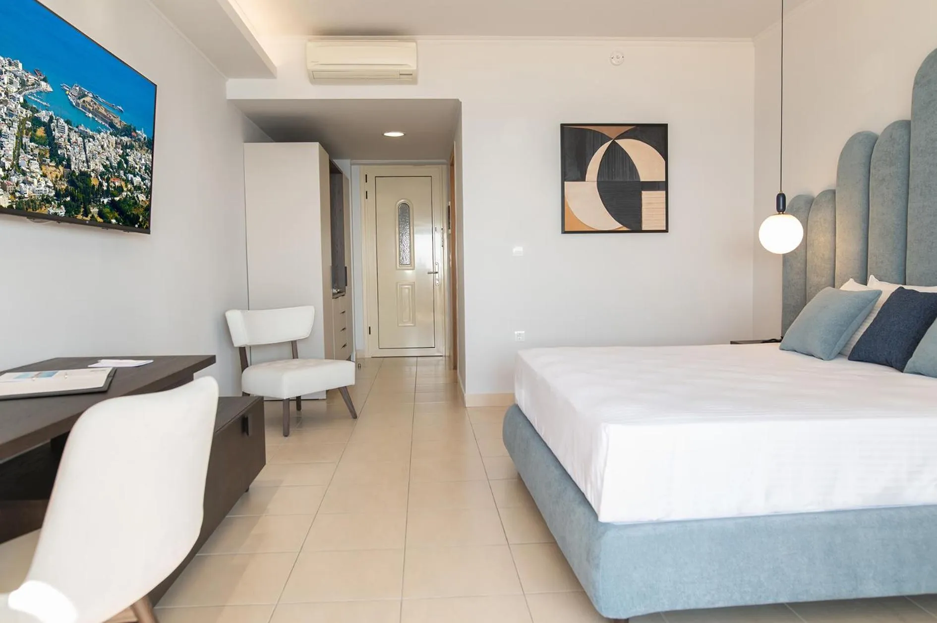 Bed in Grand Blue Beach Hotel