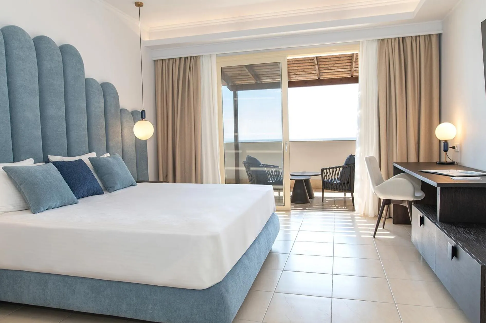 Bed in Grand Blue Beach Hotel