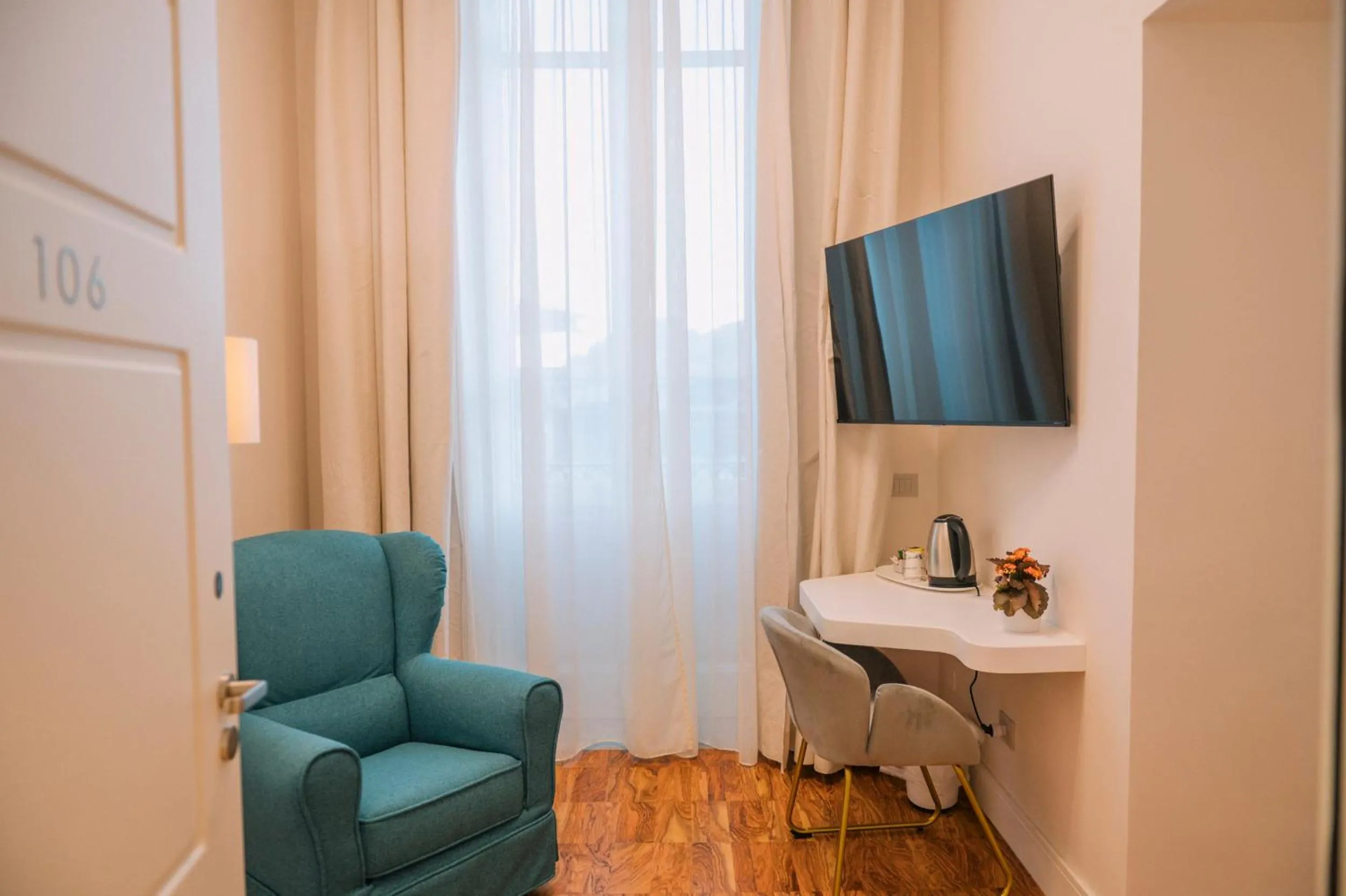 Seating area in Villa Maria Teresa Boutique Hotel