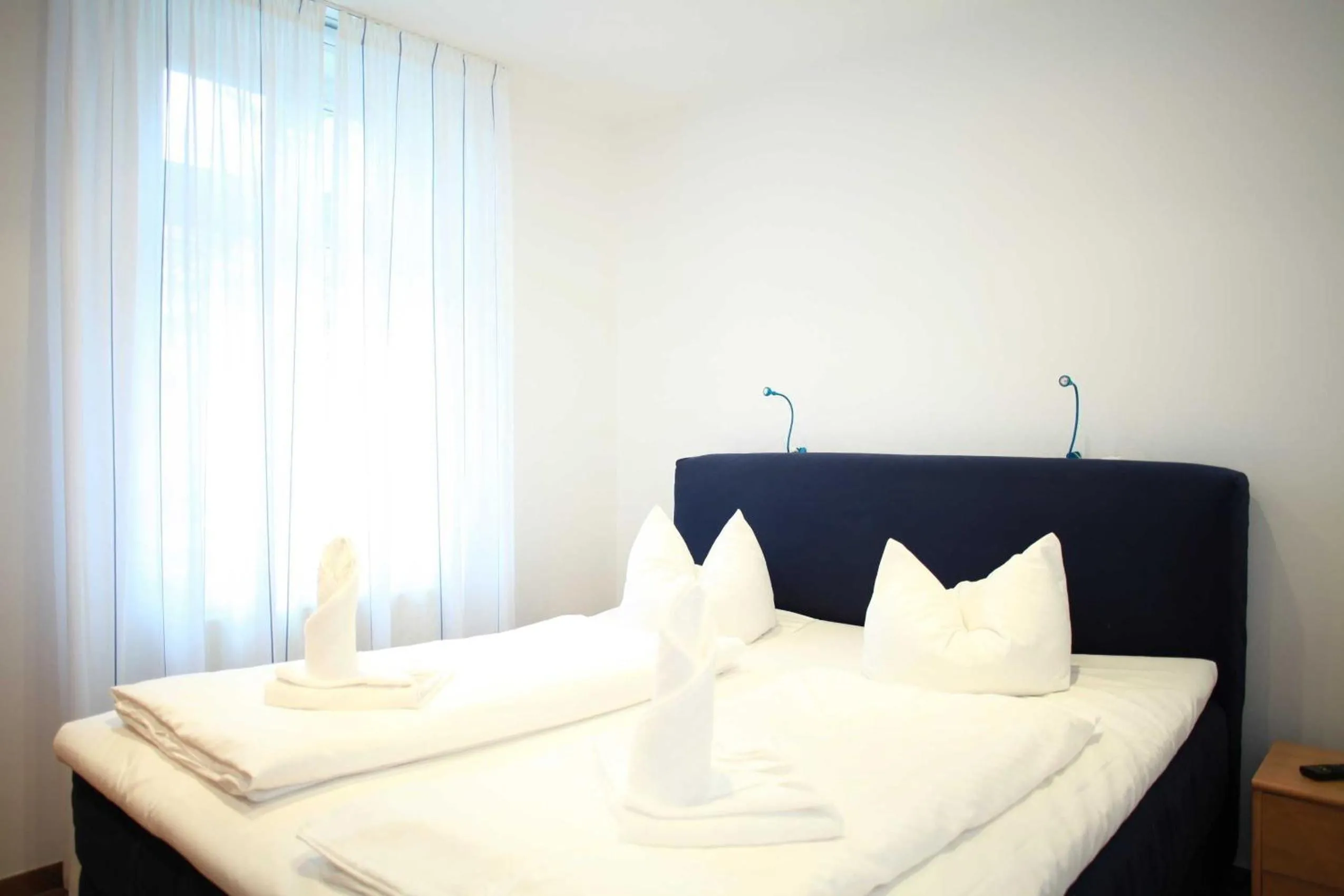 Bed in Ferienwohnung Warnemünde L (S)