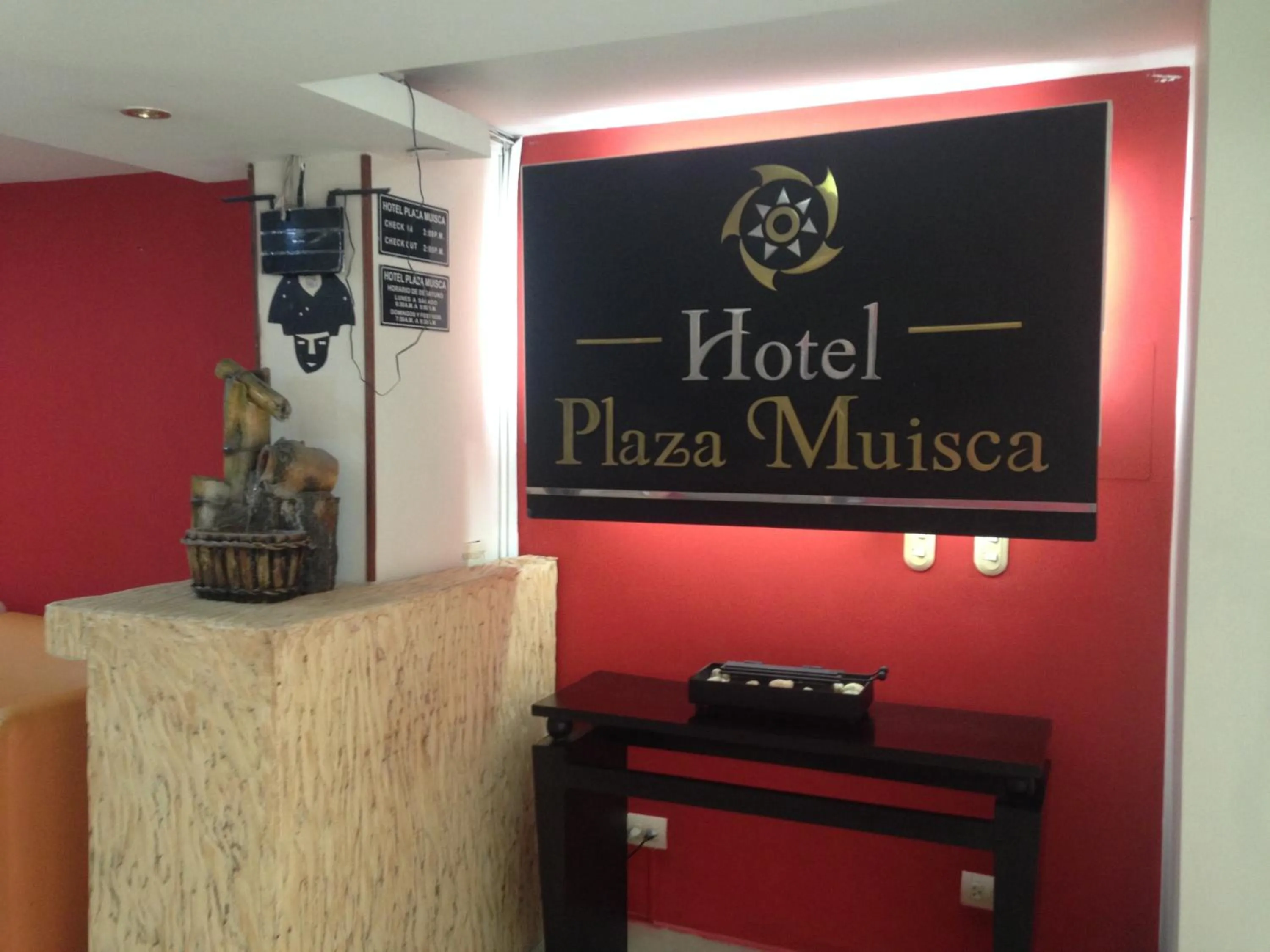 Property logo or sign in Hotel Plaza Muisca