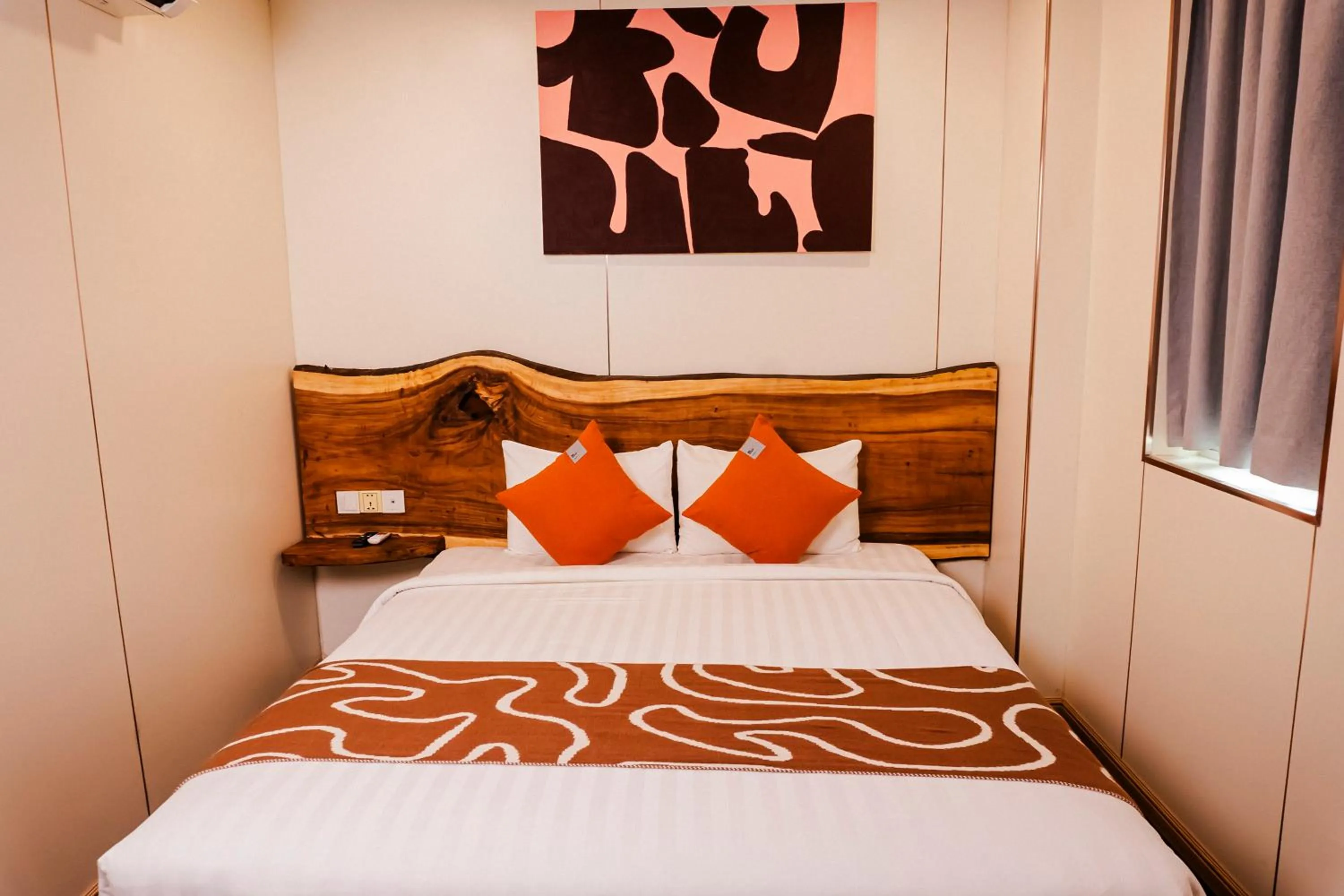 Bed in Monsoon Bassac Hotel