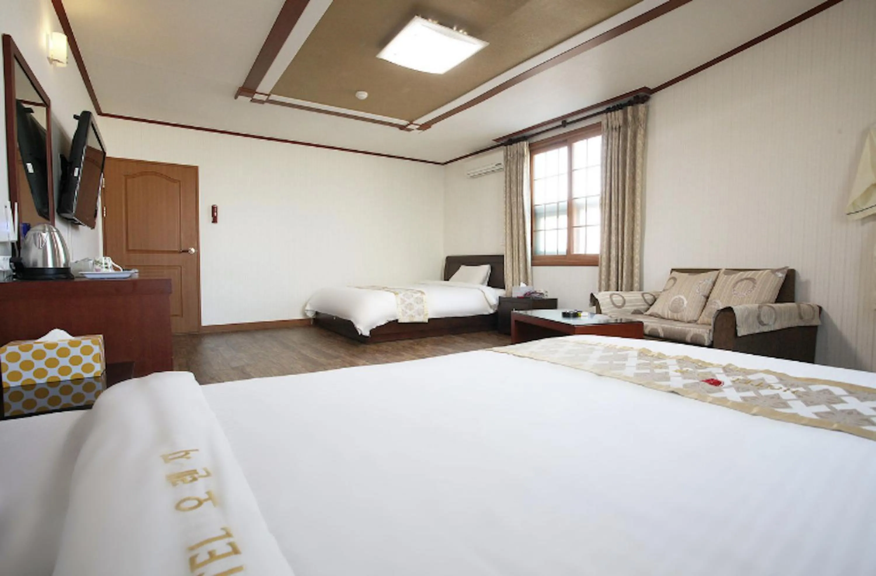 Bed in Orange Hotel Jeju