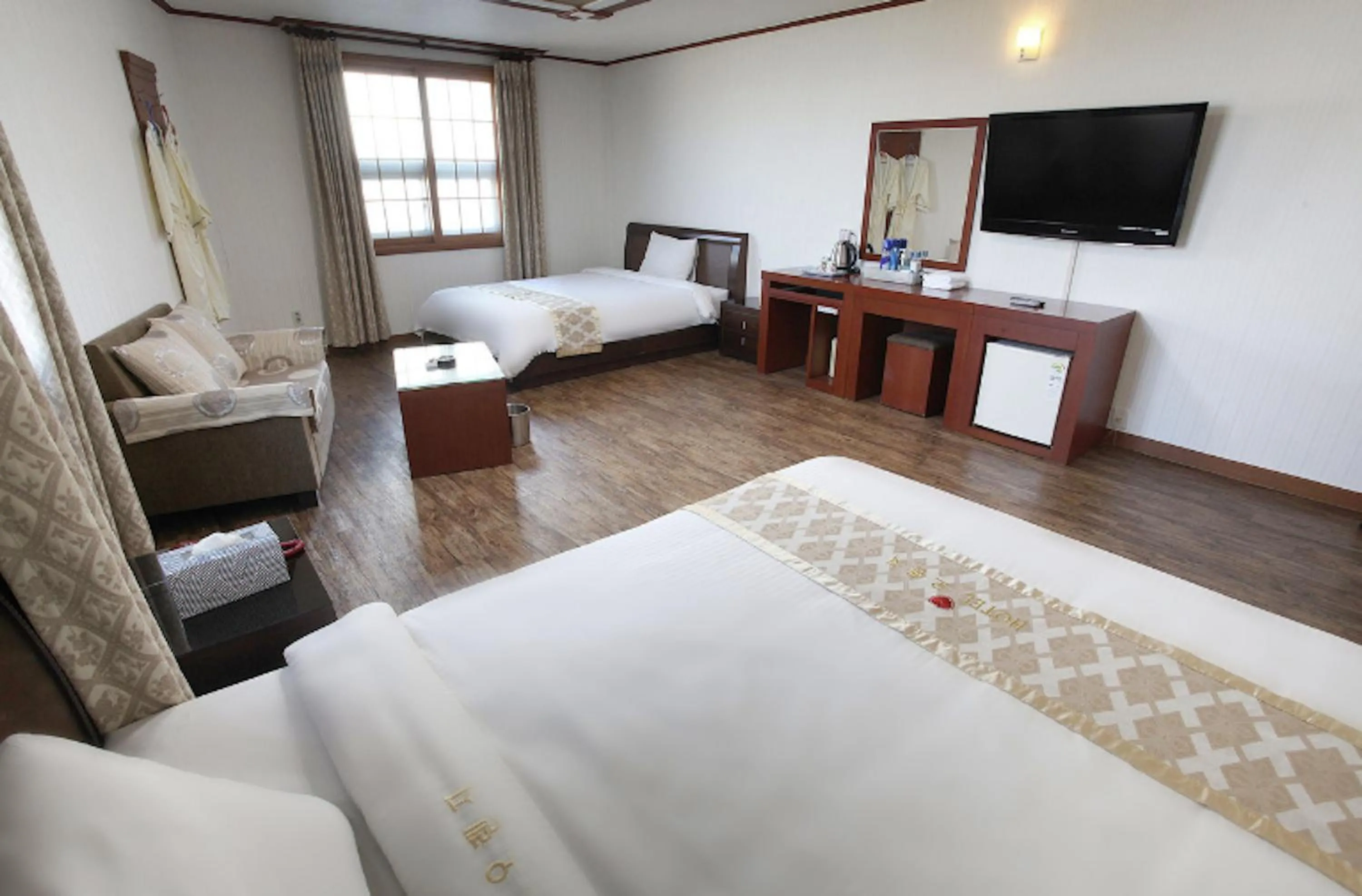 Bed in Orange Hotel Jeju