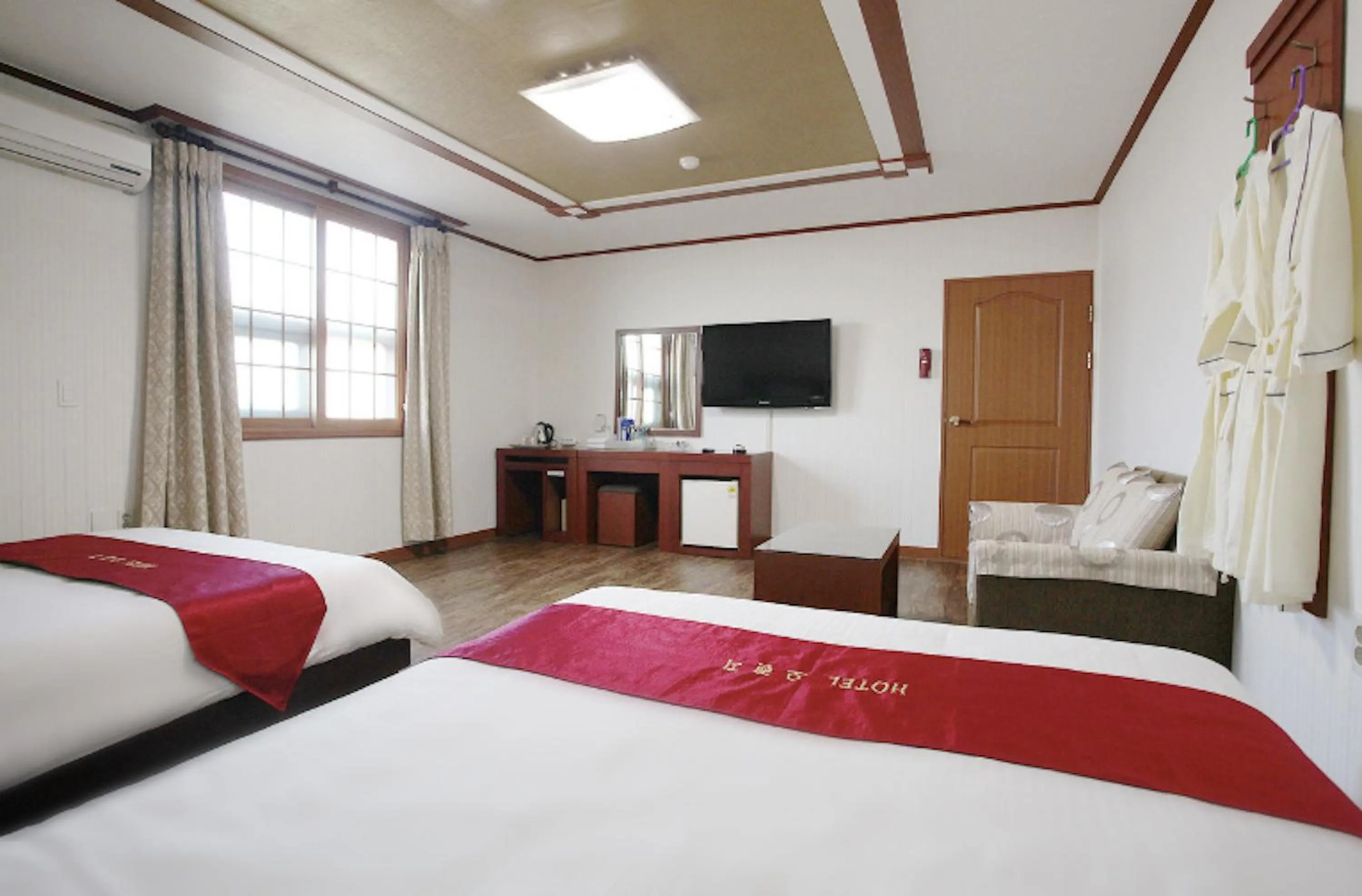 Bed in Orange Hotel Jeju