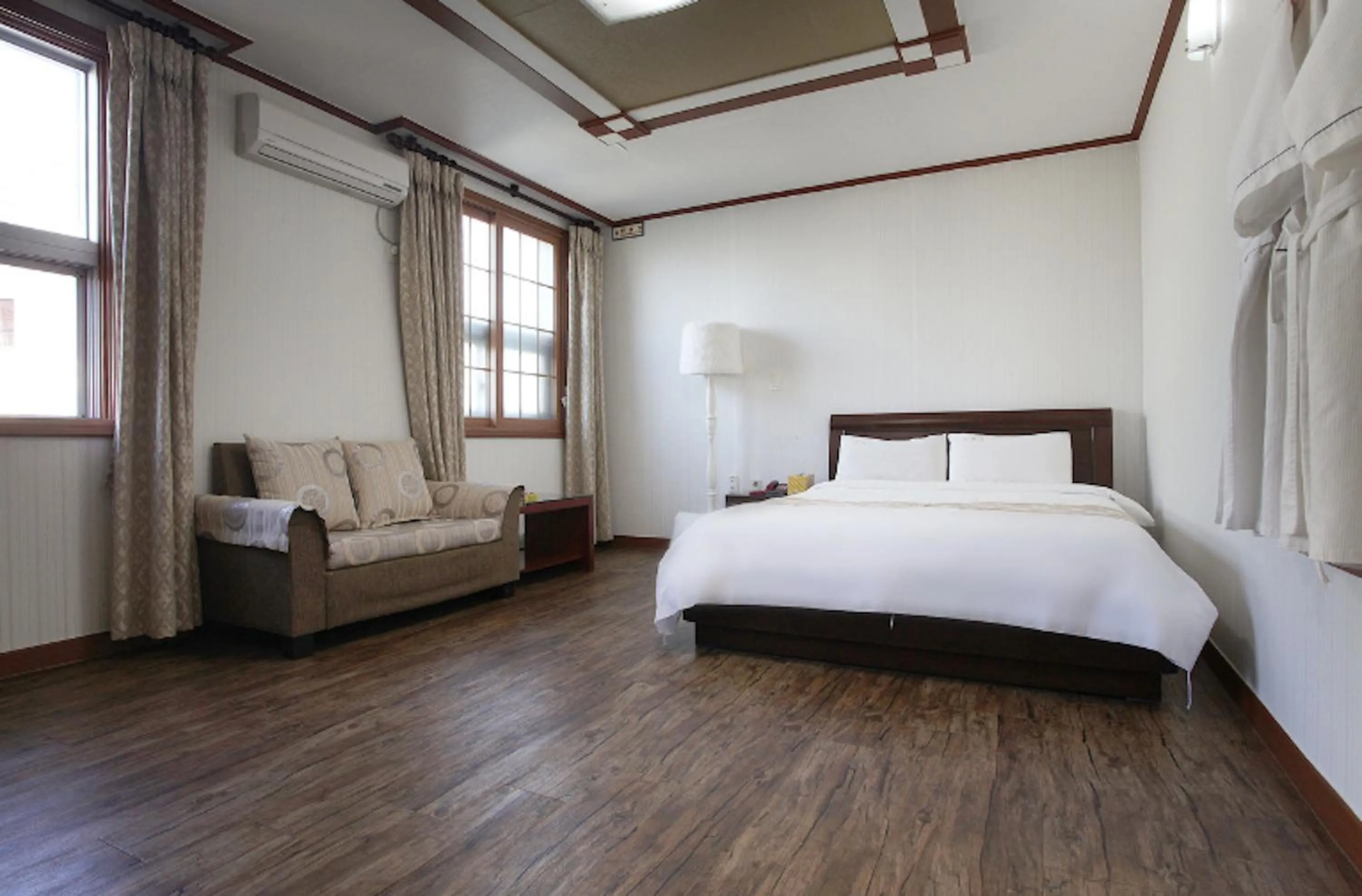 Bed in Orange Hotel Jeju
