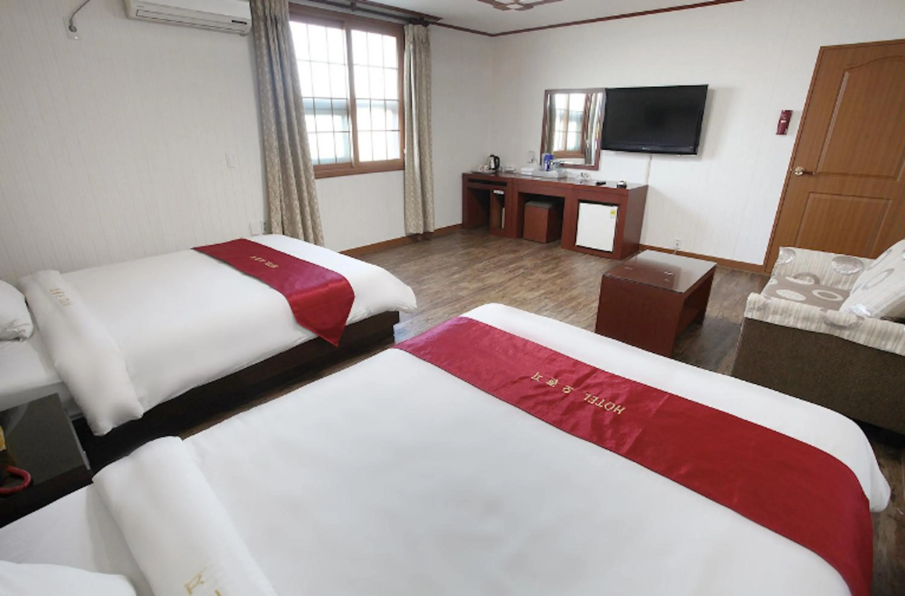 Bed in Orange Hotel Jeju
