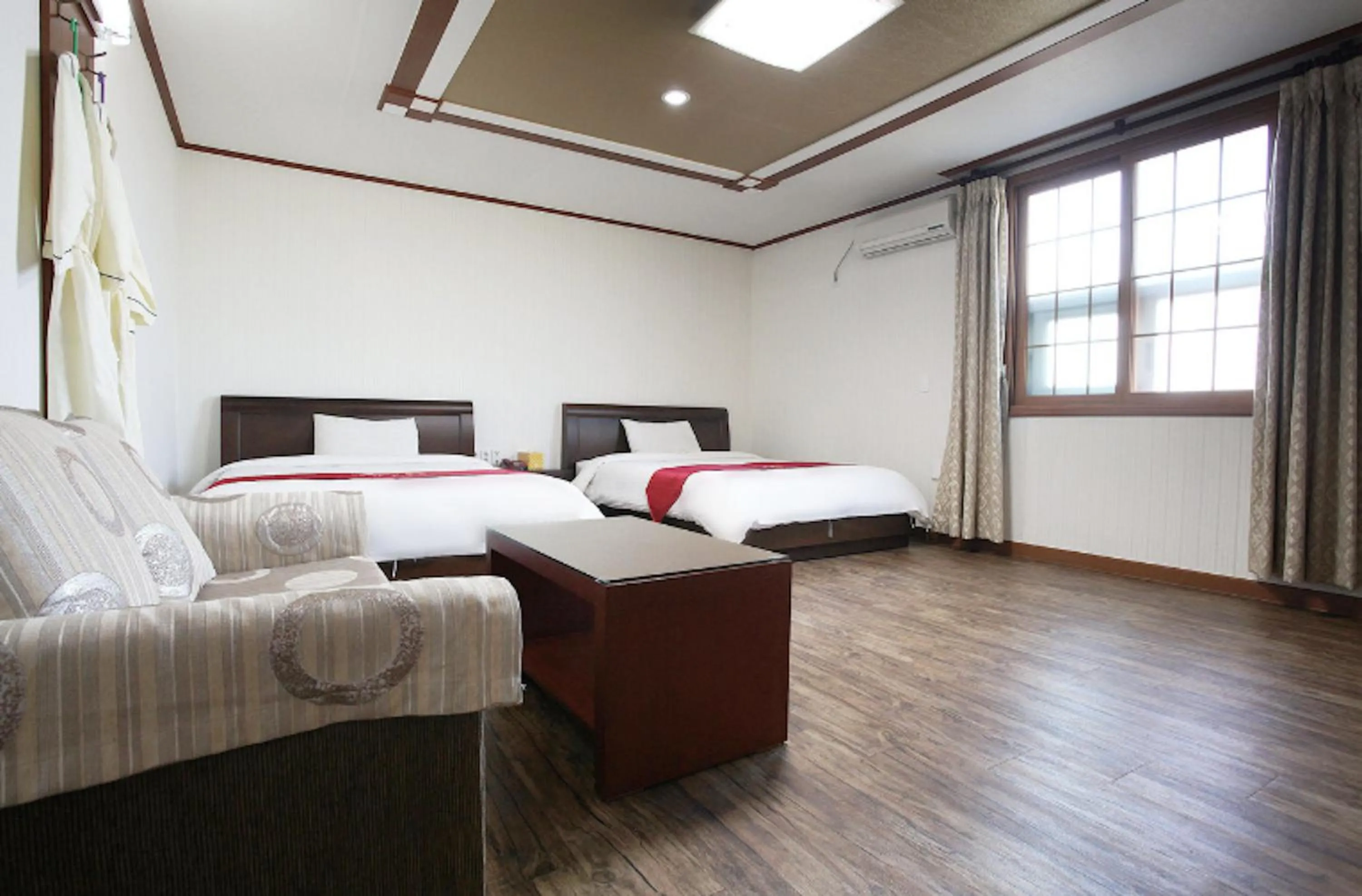 Bed in Orange Hotel Jeju