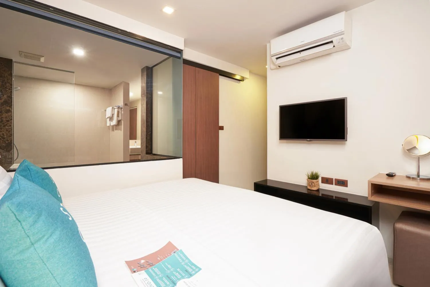 Bed in Cross Vibe Chiang Mai Decem Nimman Hotel