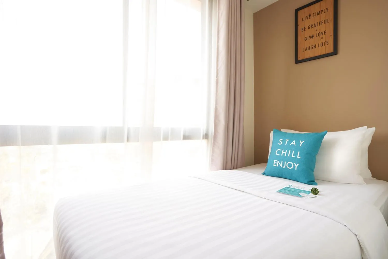 Bed in Cross Vibe Chiang Mai Decem Nimman Hotel