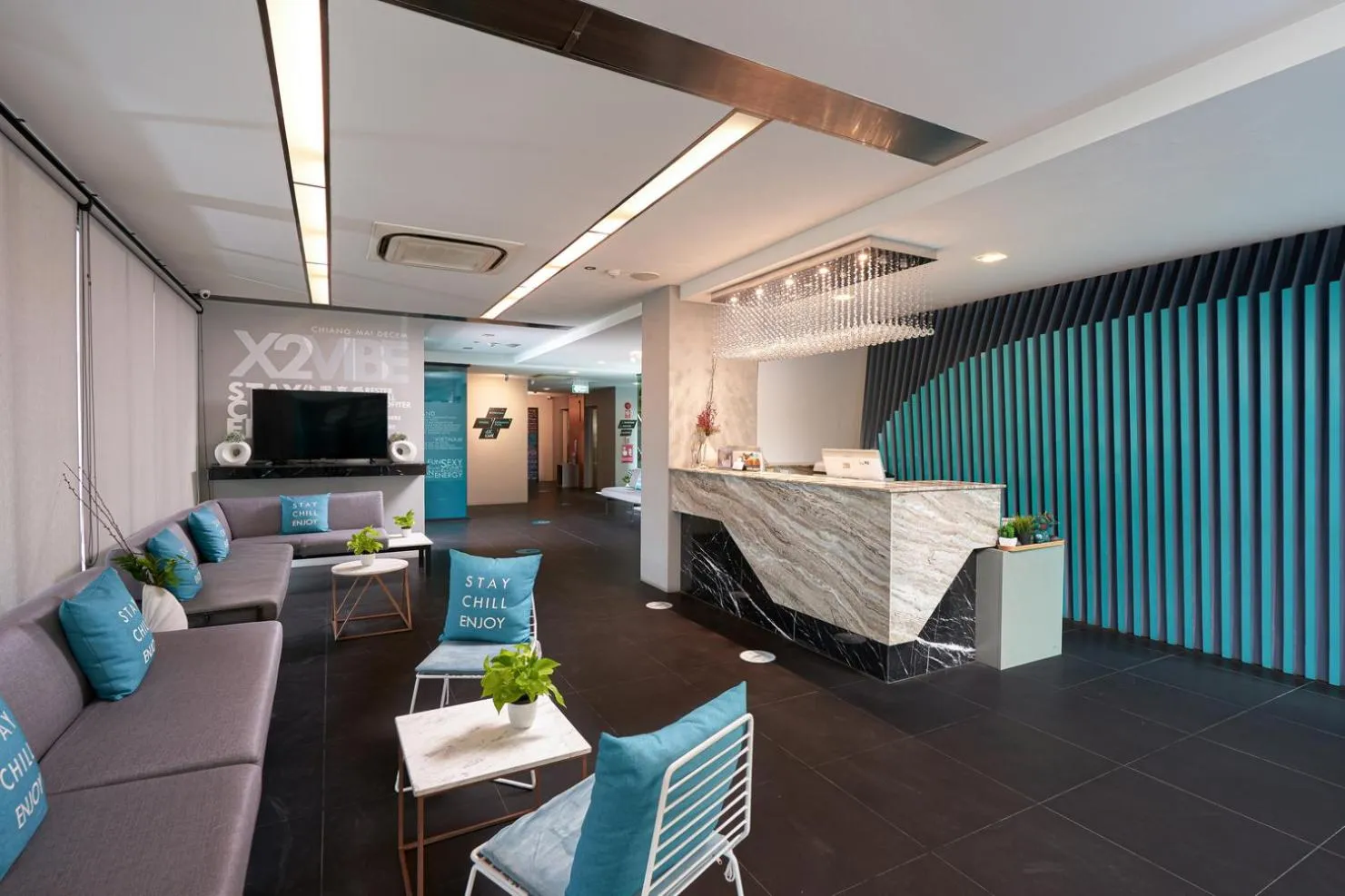 Lobby or reception in Cross Vibe Chiang Mai Decem Nimman Hotel