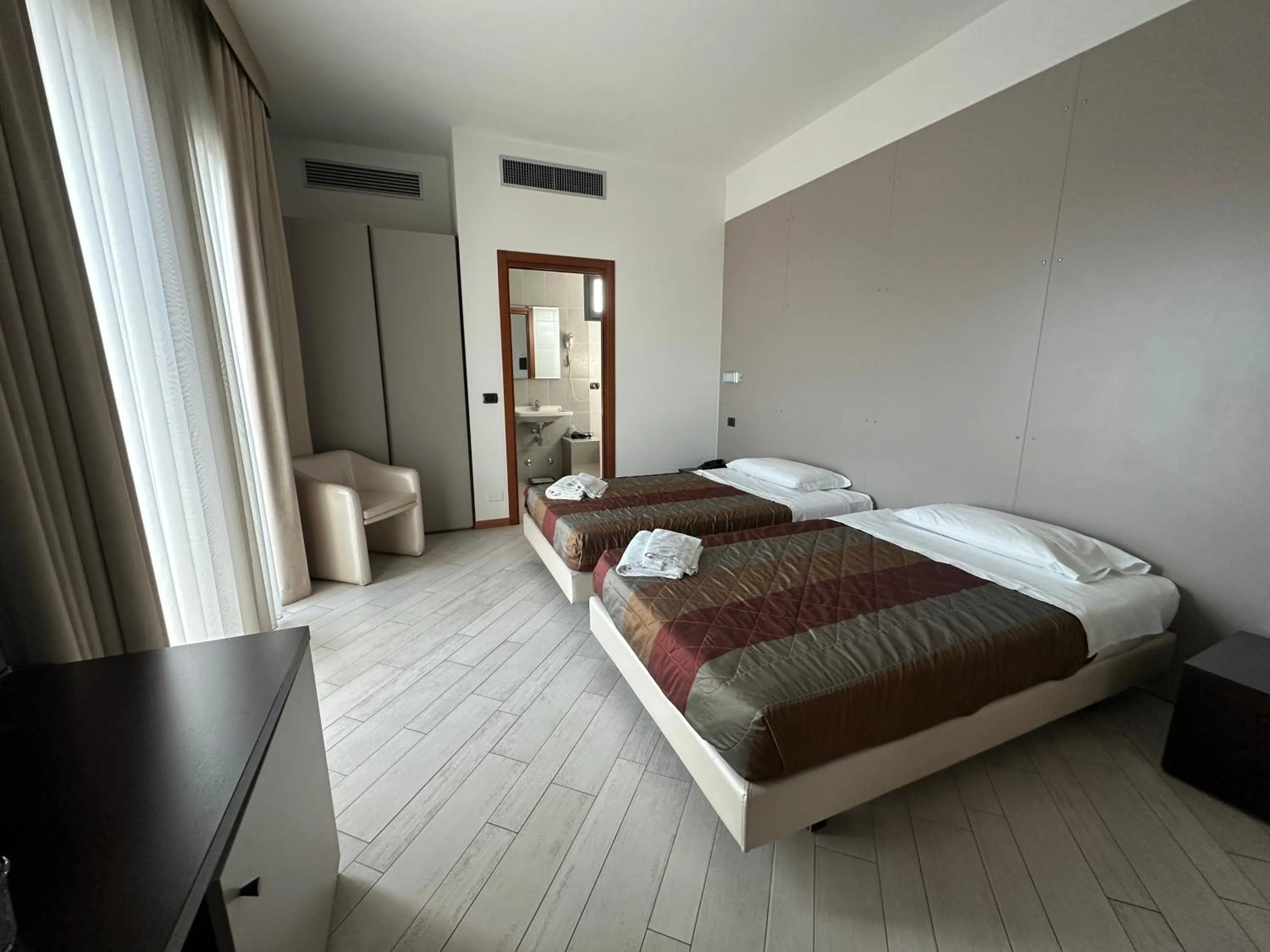 Bed in Hotel San Clemente