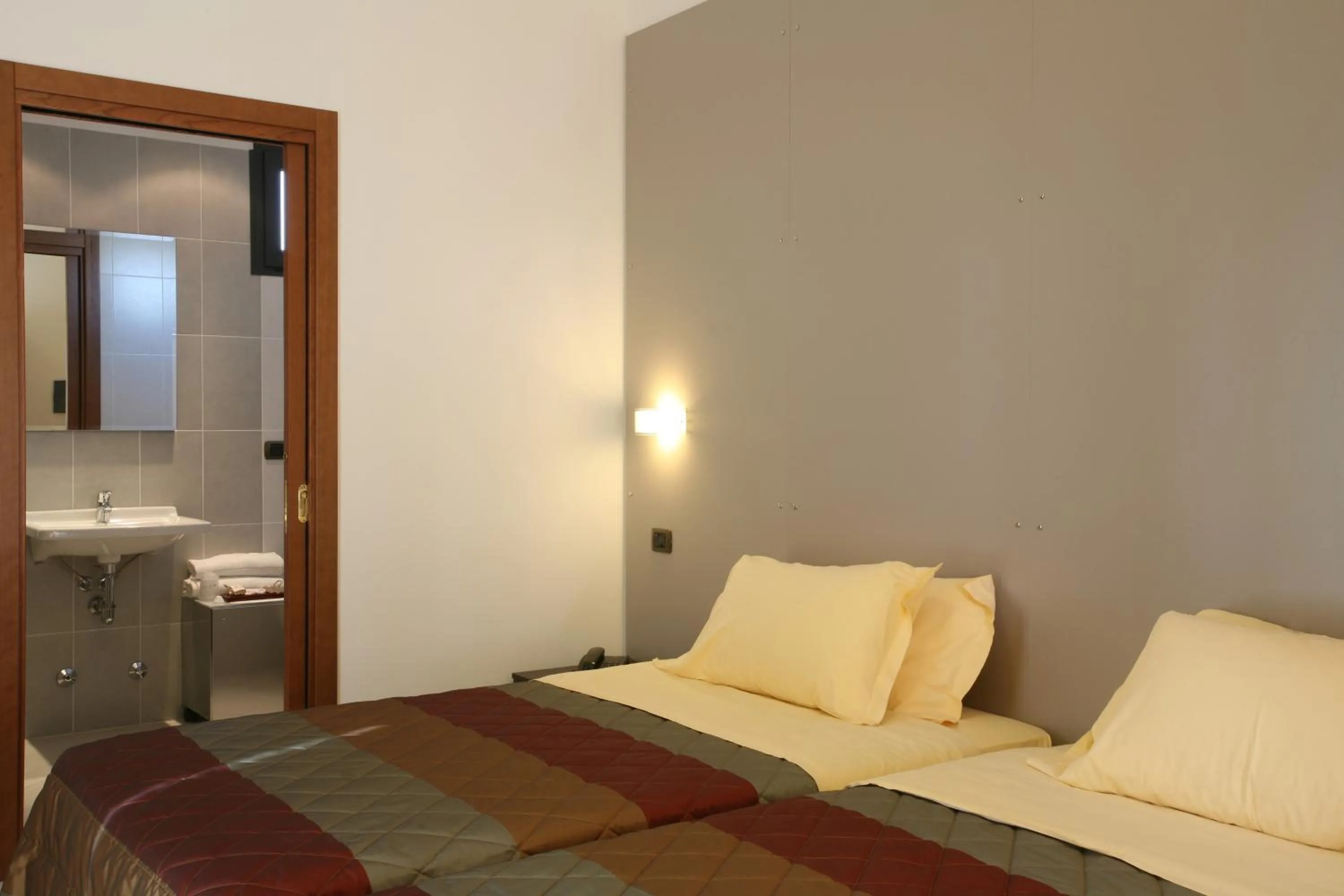 Bed in Hotel San Clemente