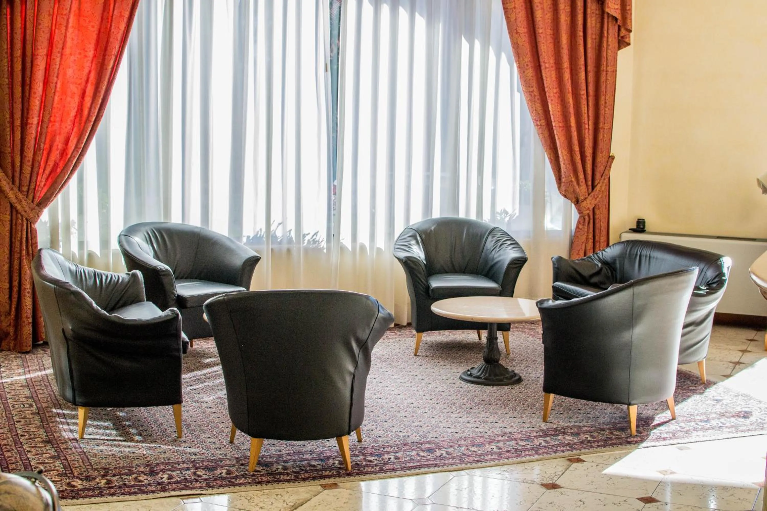 Communal lounge/ TV room in Hotel San Clemente