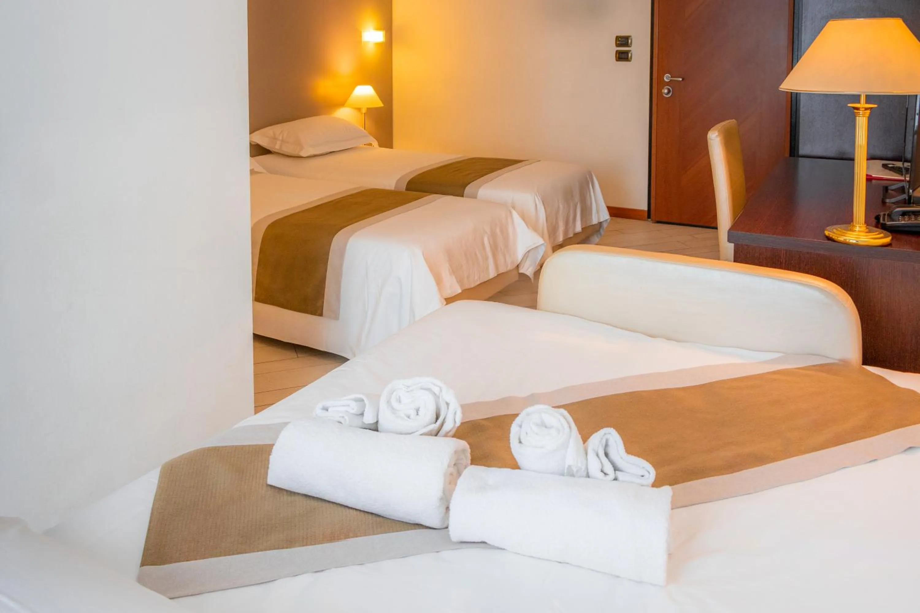 Bed in Hotel San Clemente