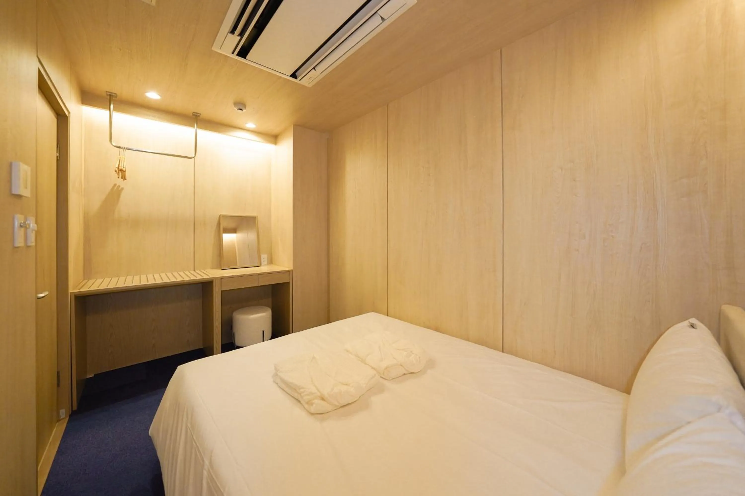 Decorative detail, Bed in UH Suite Namba Station The Spa