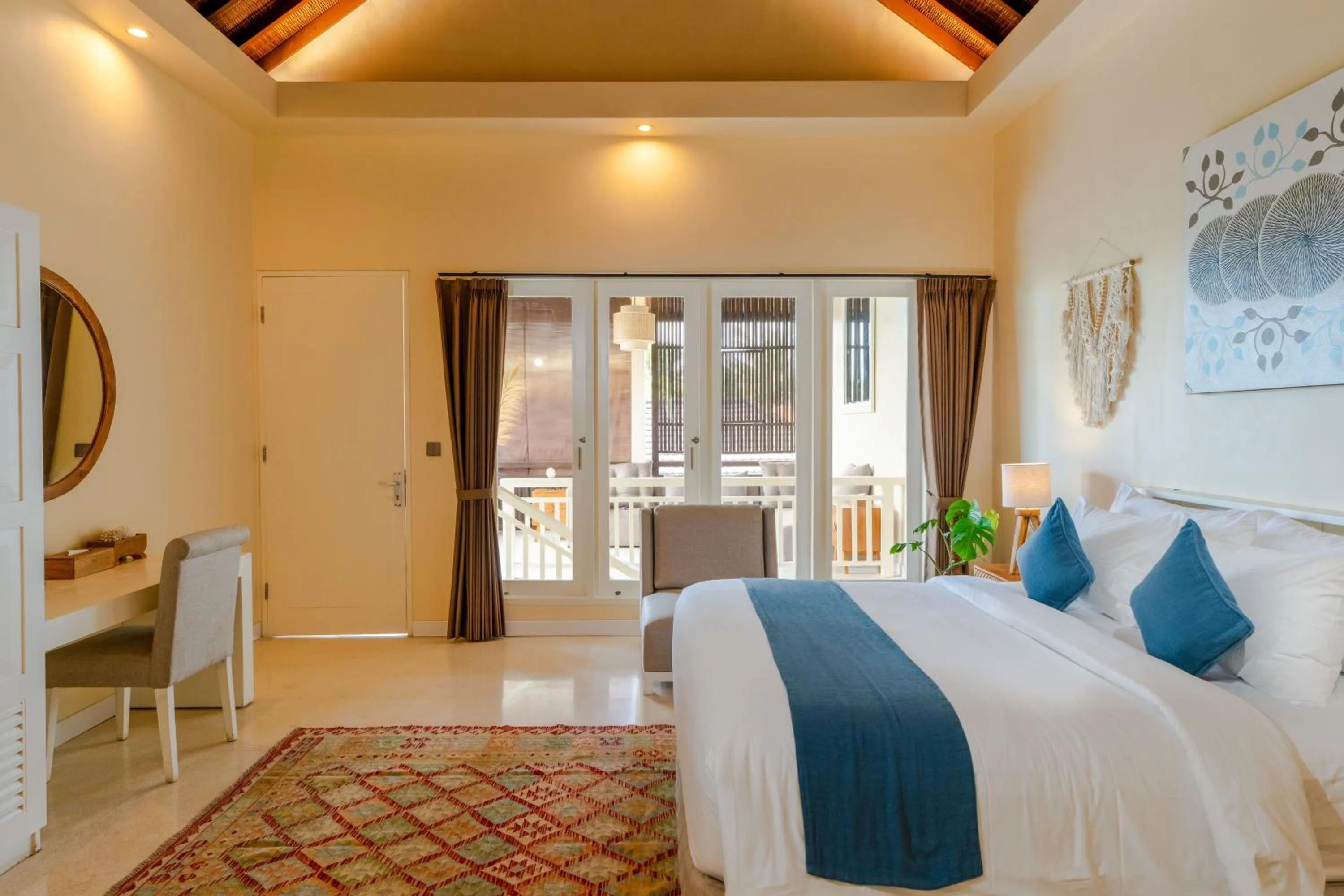 Bed in Boholuma Villas by Pertama Management