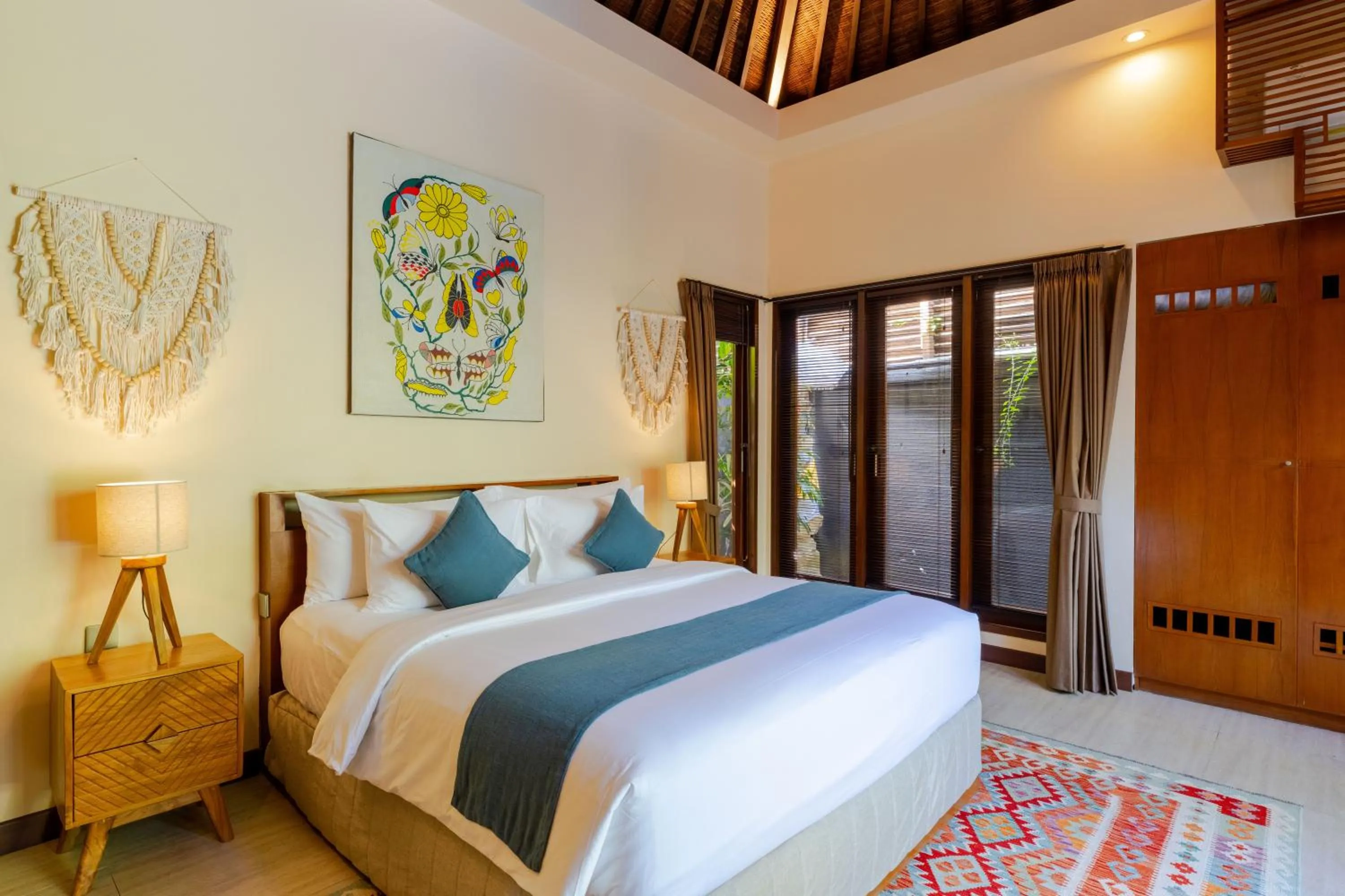 Bed in Boholuma Villas by Pertama Management