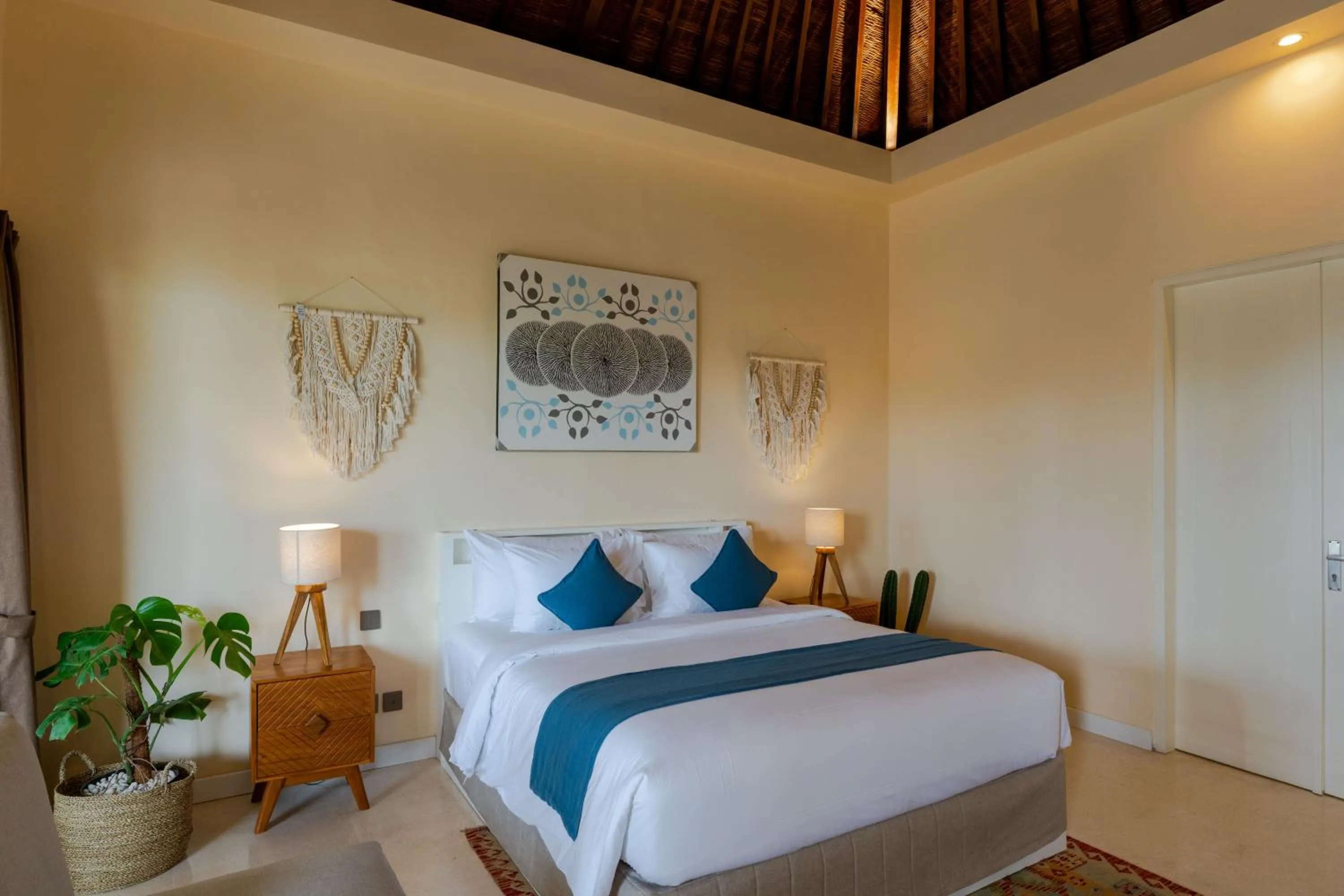 Bed in Boholuma Villas by Pertama Management